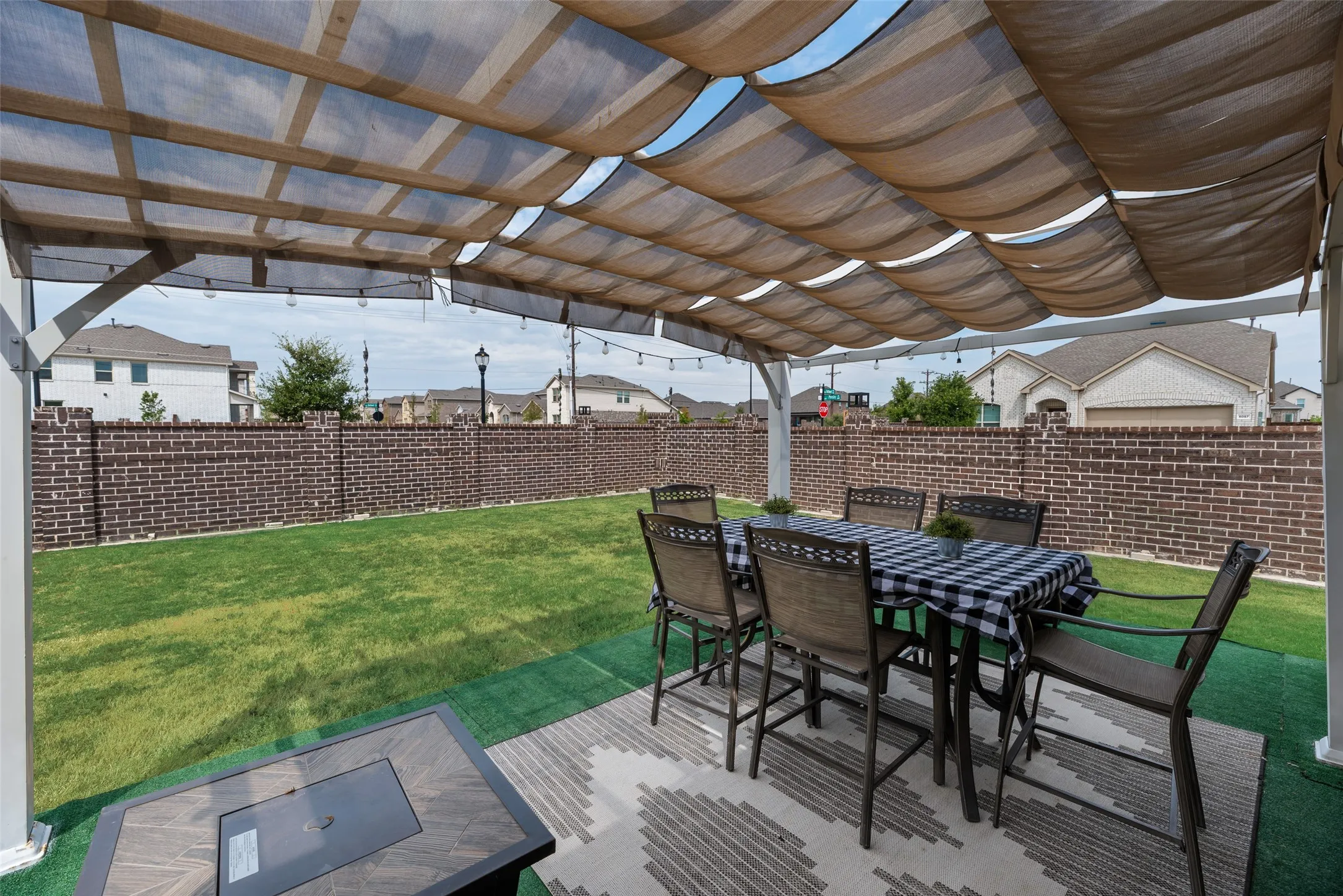 This covered patio is perfect for entertaining or relaxing! This pergola is ready for you!