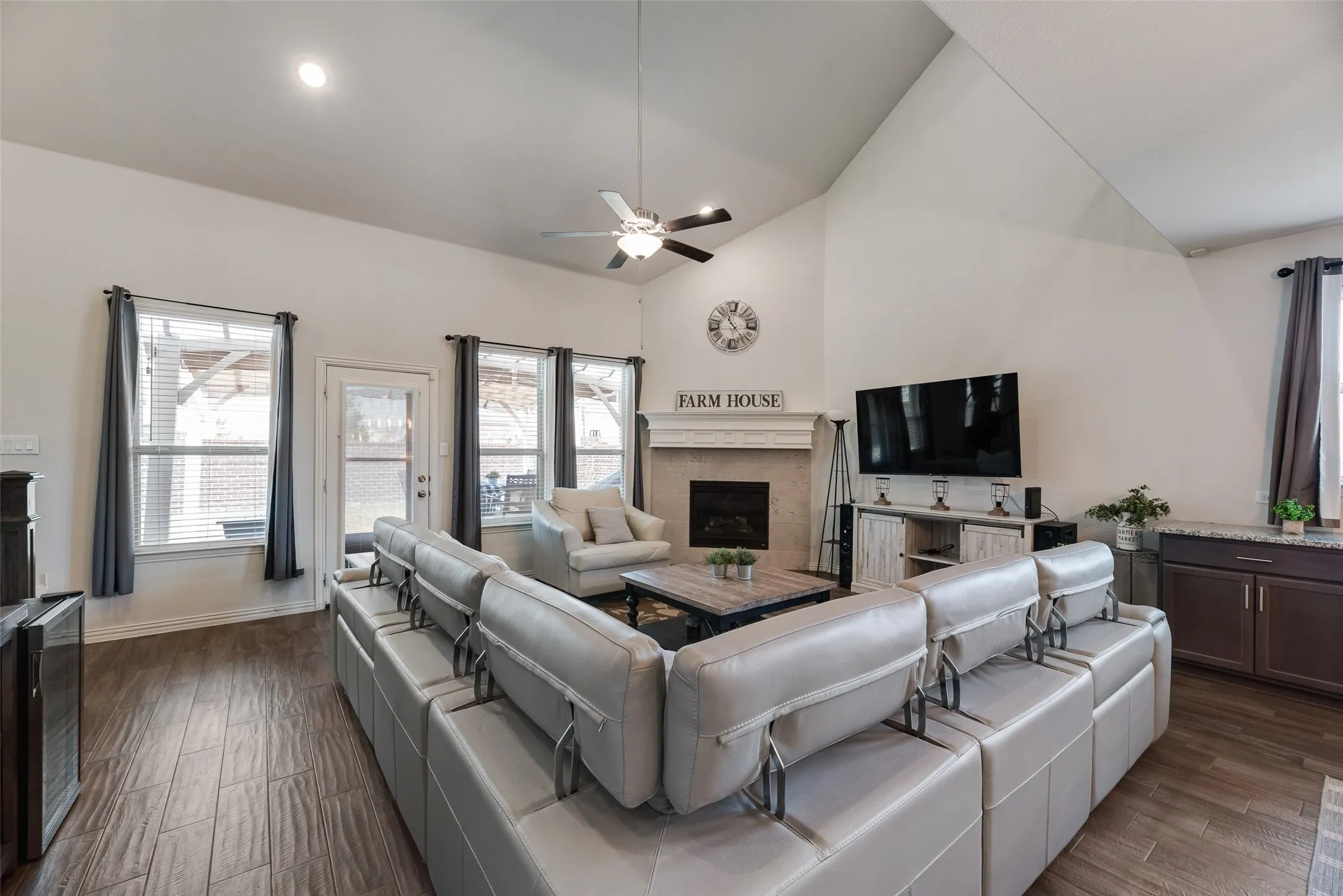 This spacious living room features a cozy Fireplace!