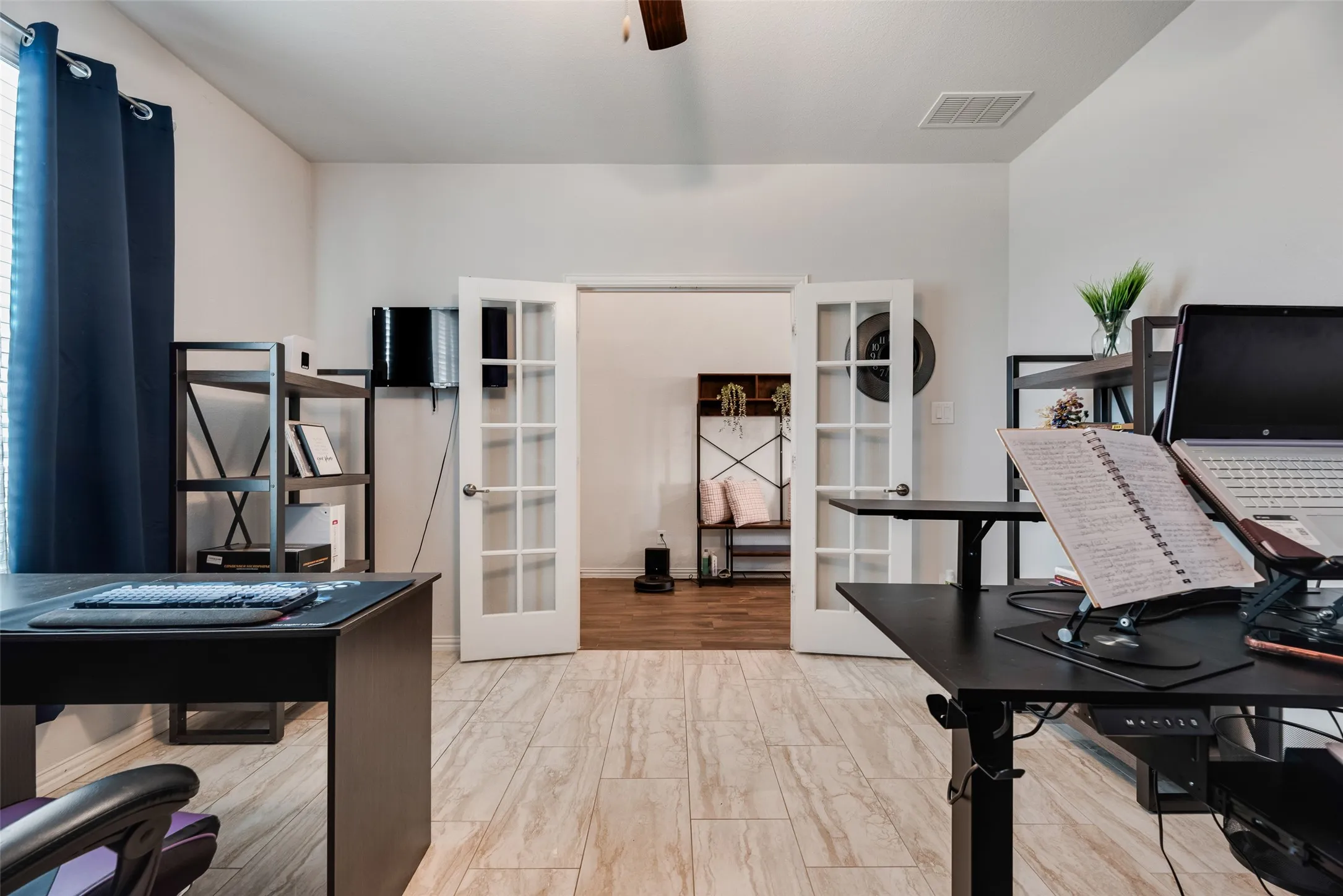 Beautiful French opens to the spacious office!
