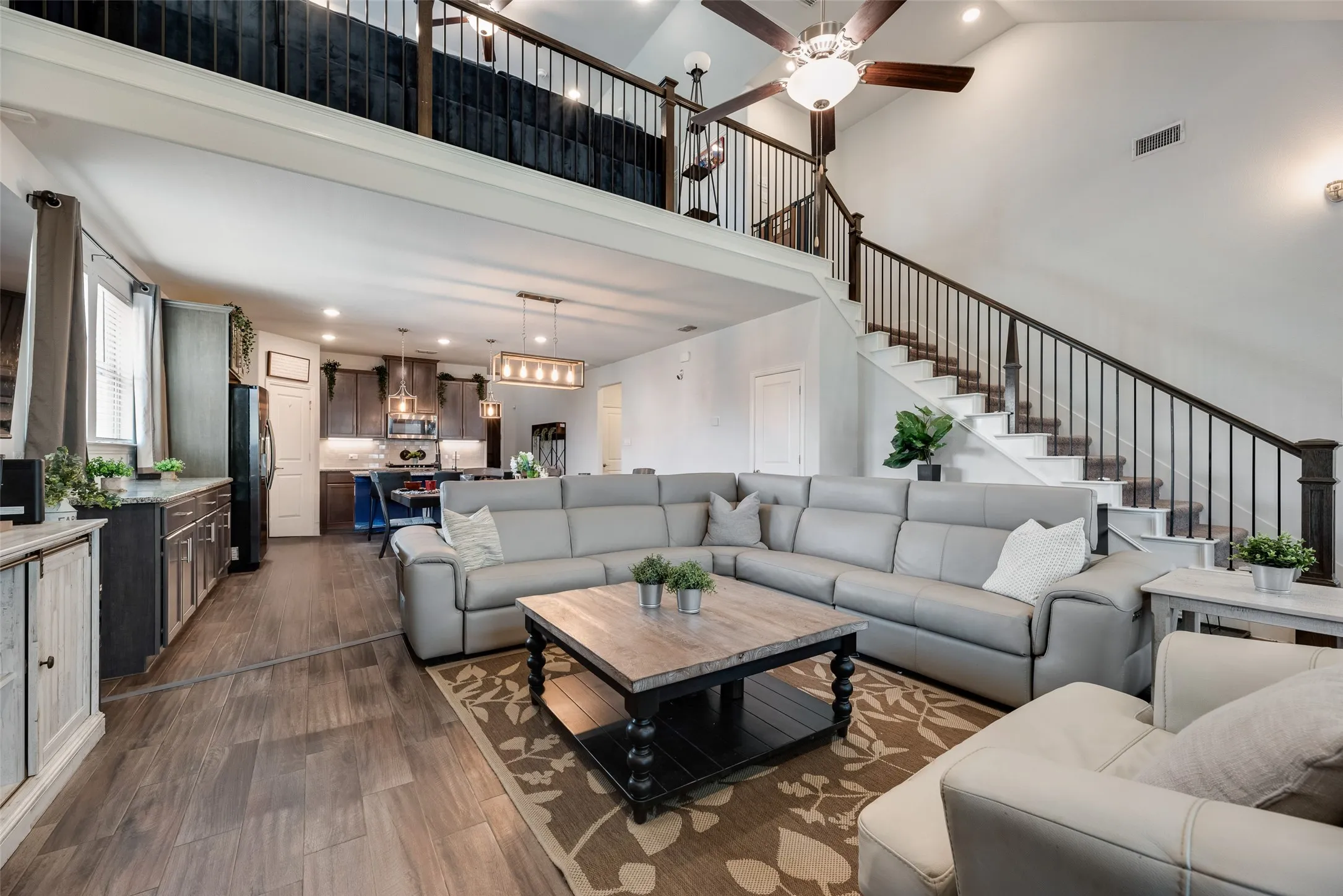 The living room opens to the beautiful kitchen!