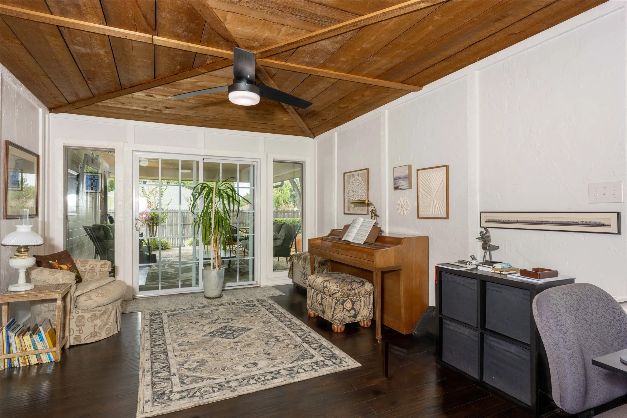Bright Sun Room with view of beautifully landscaped yard