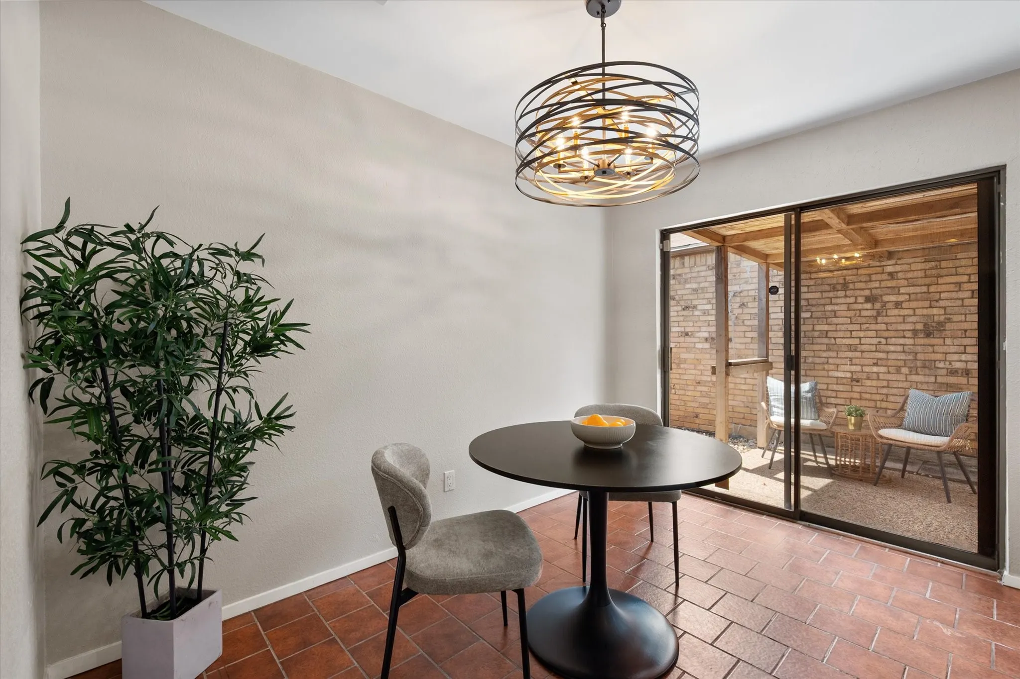 Breakfast nook with view of outdoor courtyard