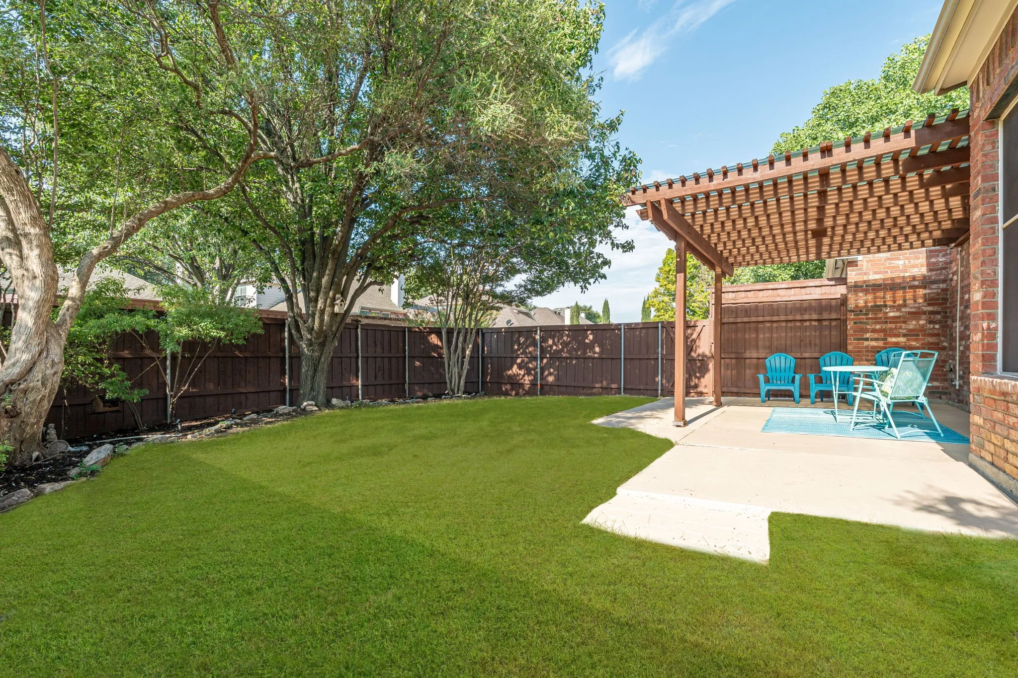 Enjoy A Stunning Backyard With Covered Patio (Grass Has Been Virtually Greened)