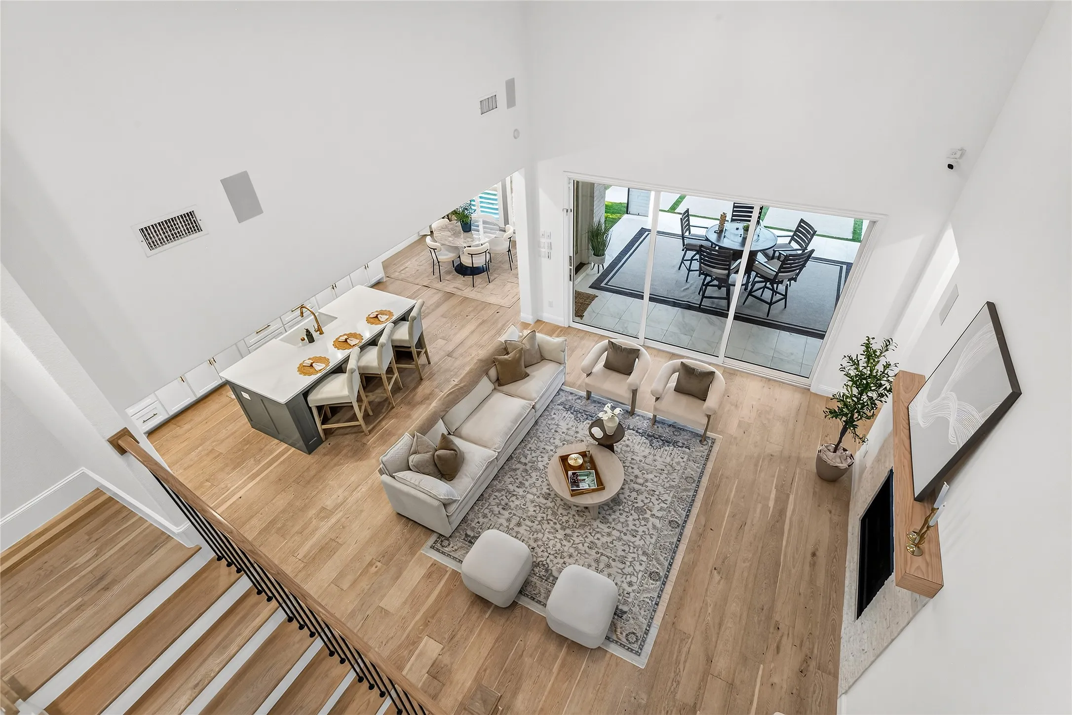 Dramatic two-story ceilings and an open loft overlook add architectural drama.