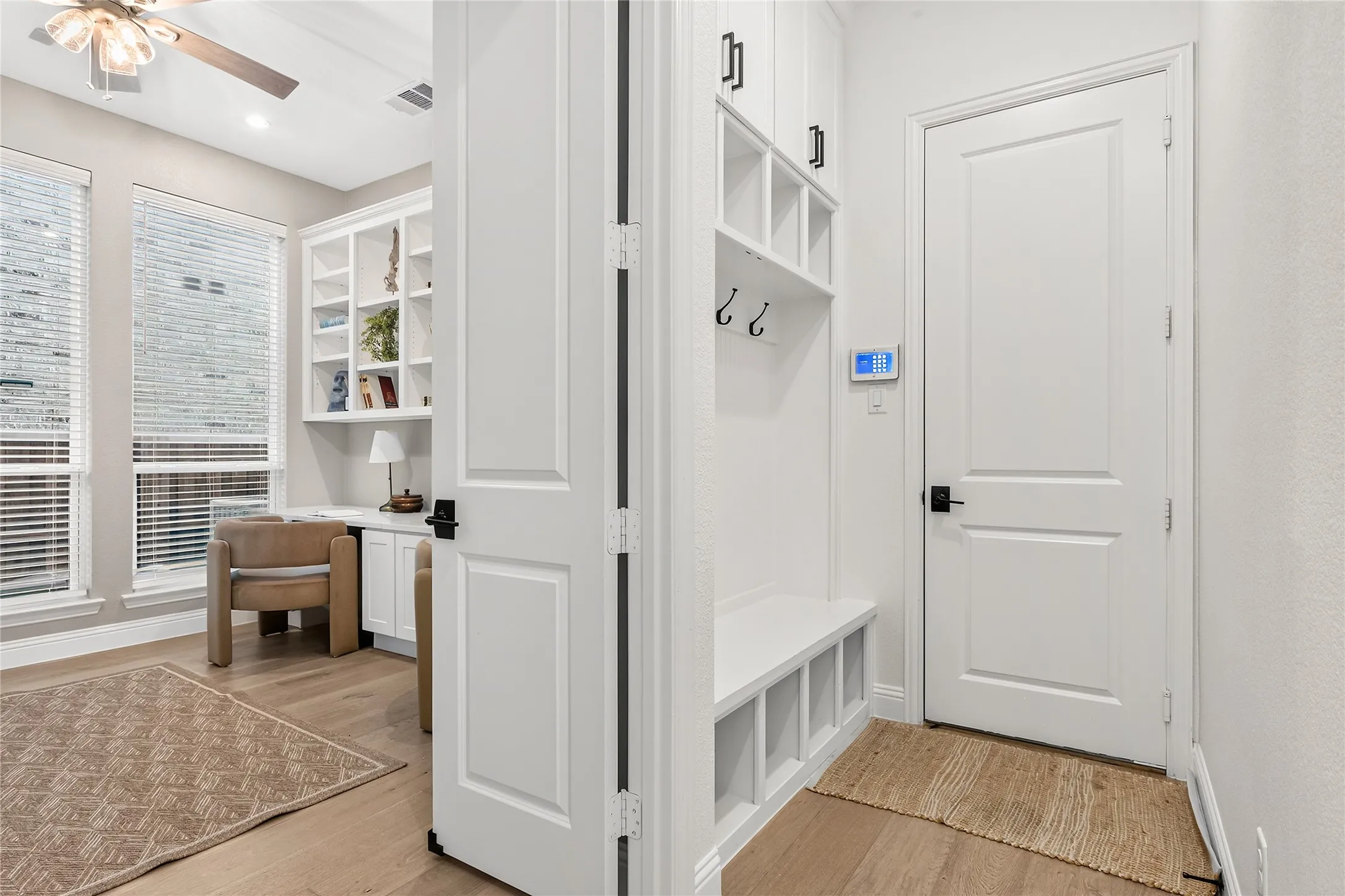 Mud room from garage to drop belongings out of sight of entertaining areas