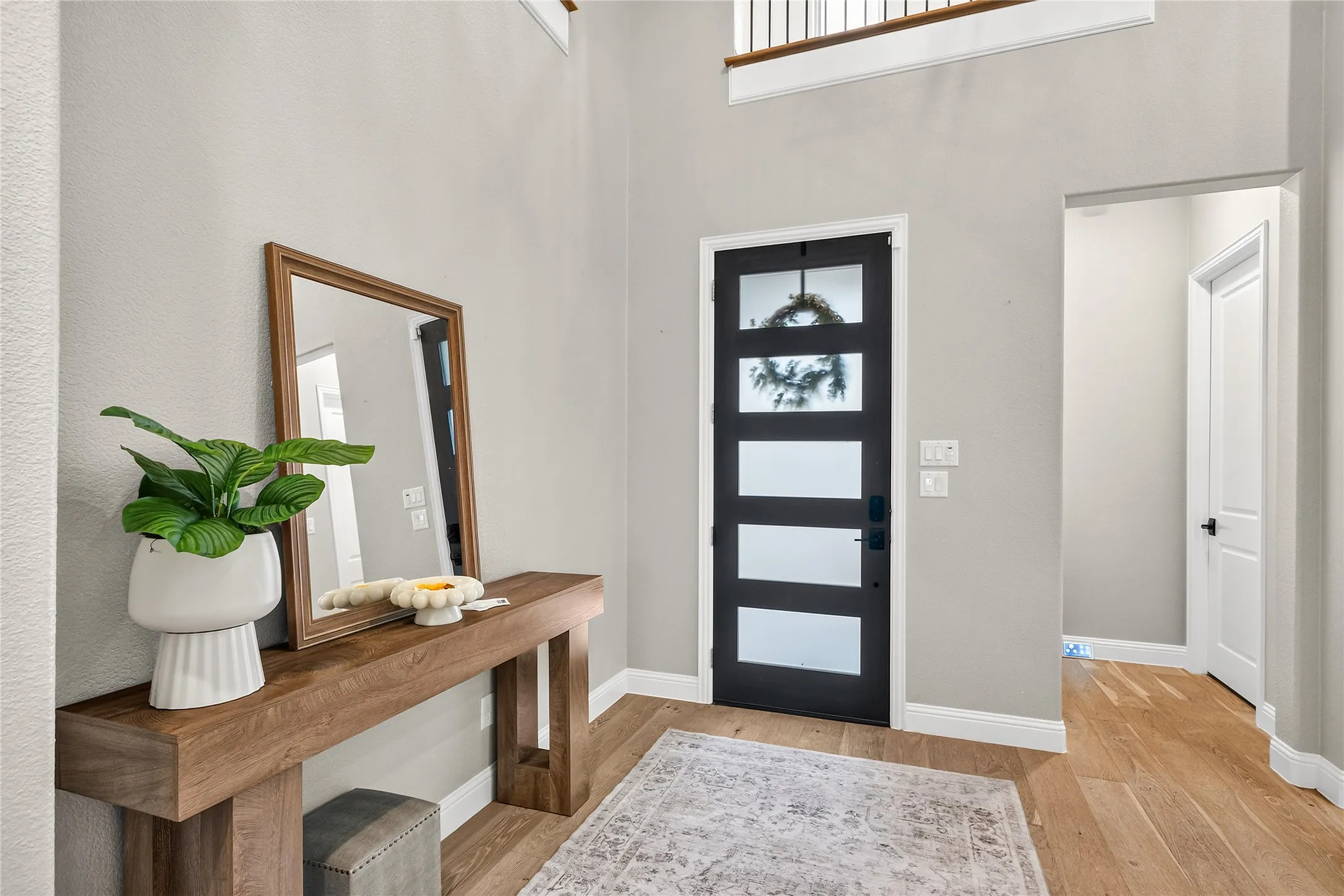 Charming covered entry welcomes you into a bright open floor plan