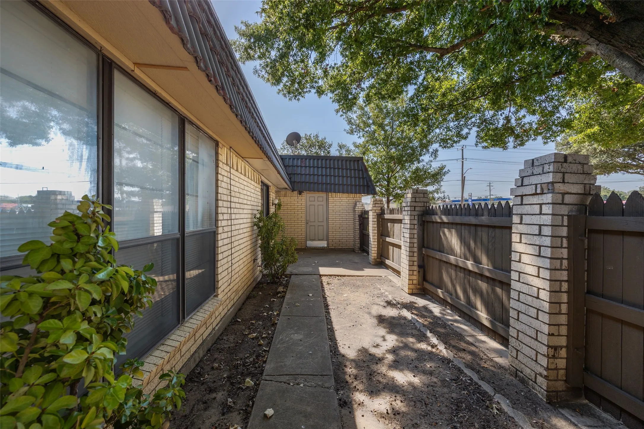 Side Patio with view of storage area closet