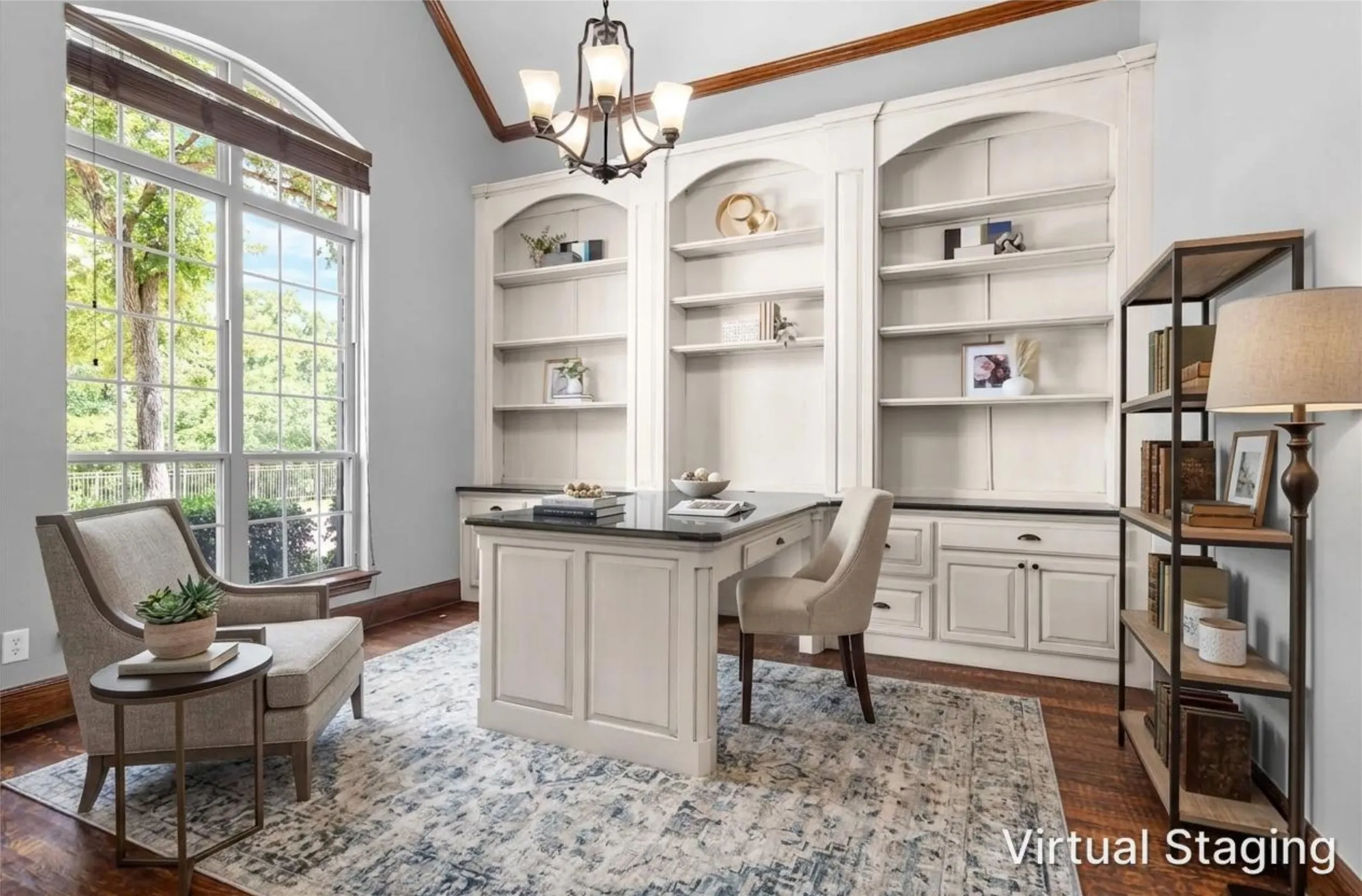 Private home office featuring custom built-in shelving, desk & granite countertop