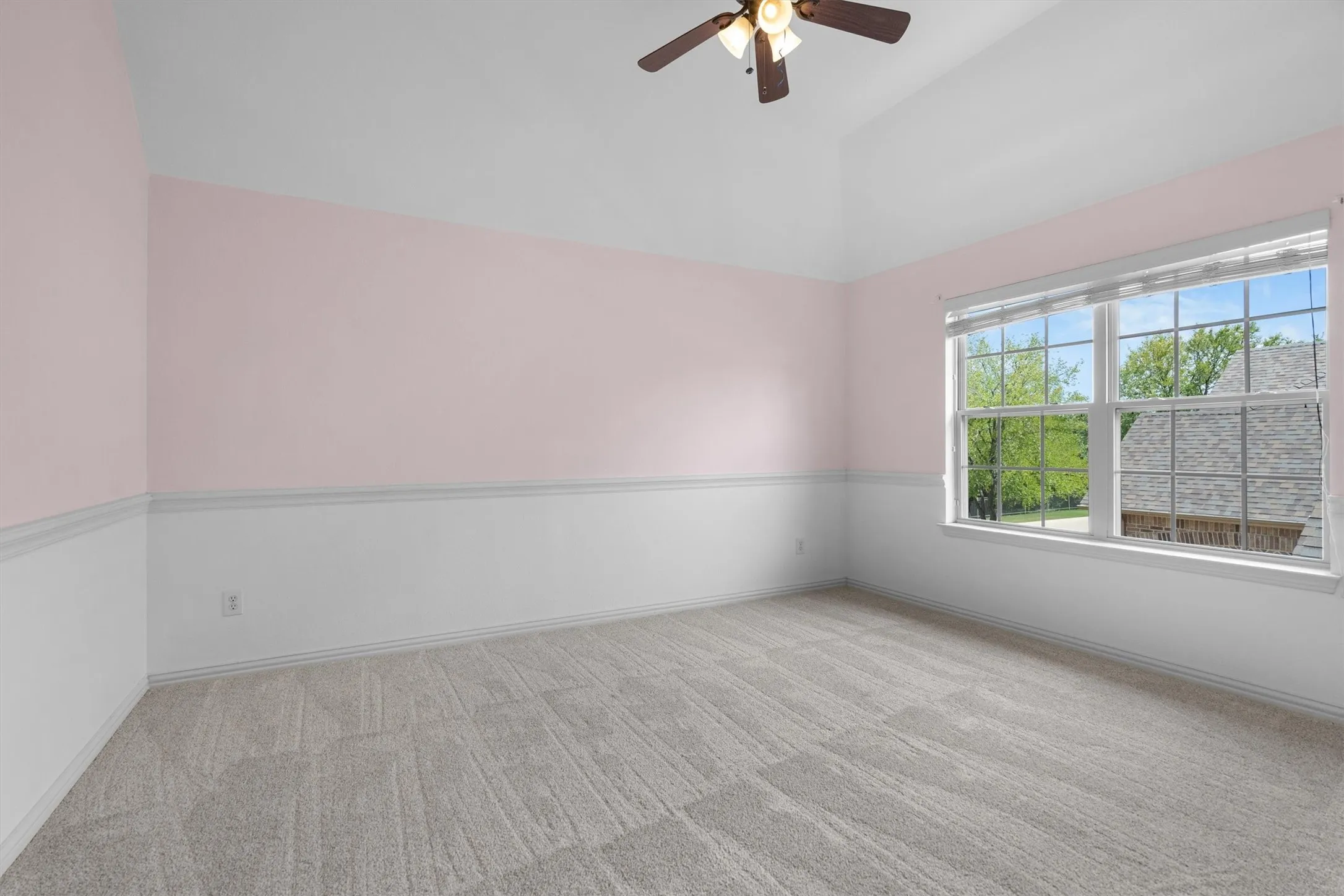 Additional upstairs bedroom offering flexible space for guests or a home office
