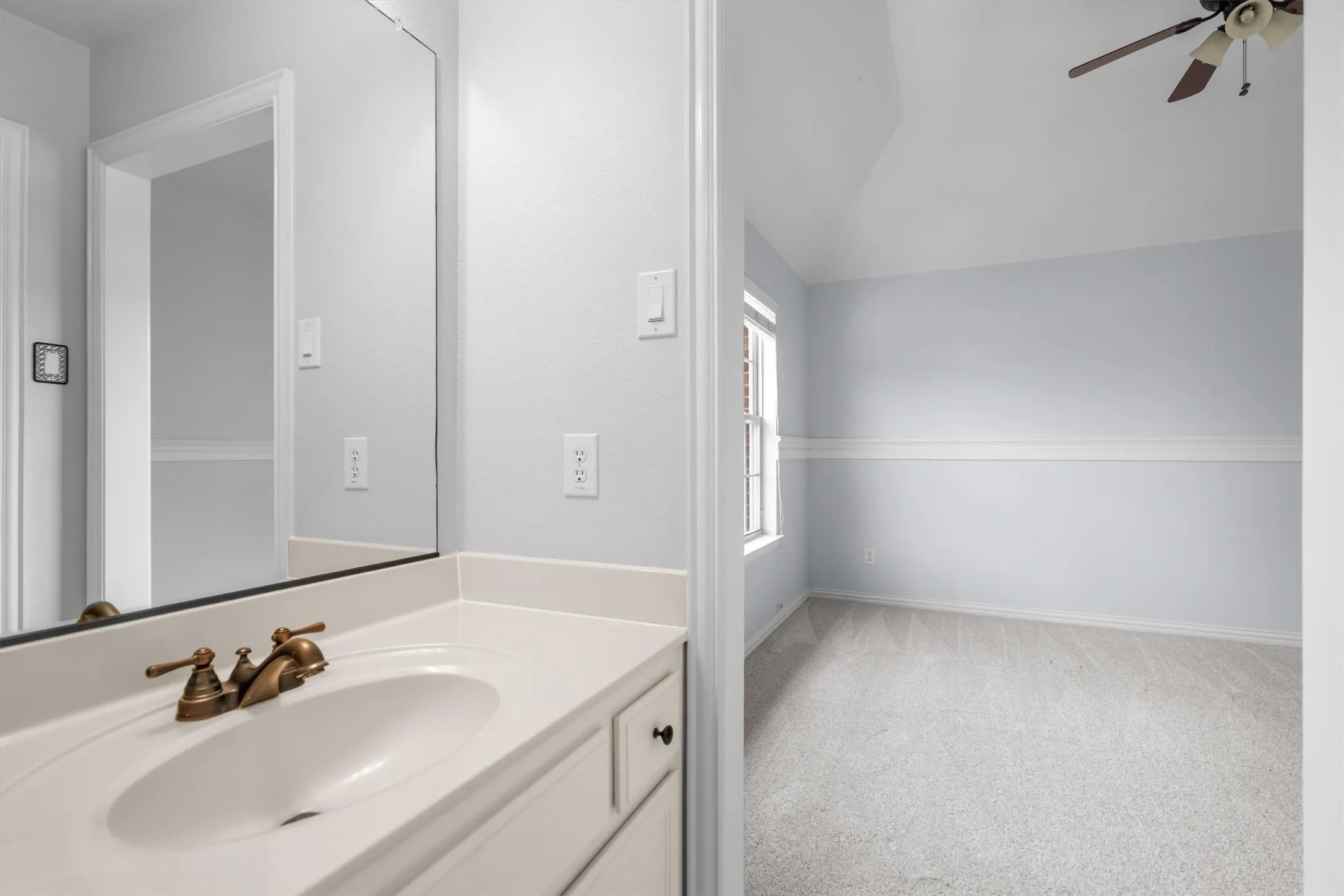 Bathroom with vanity and updated fixtures