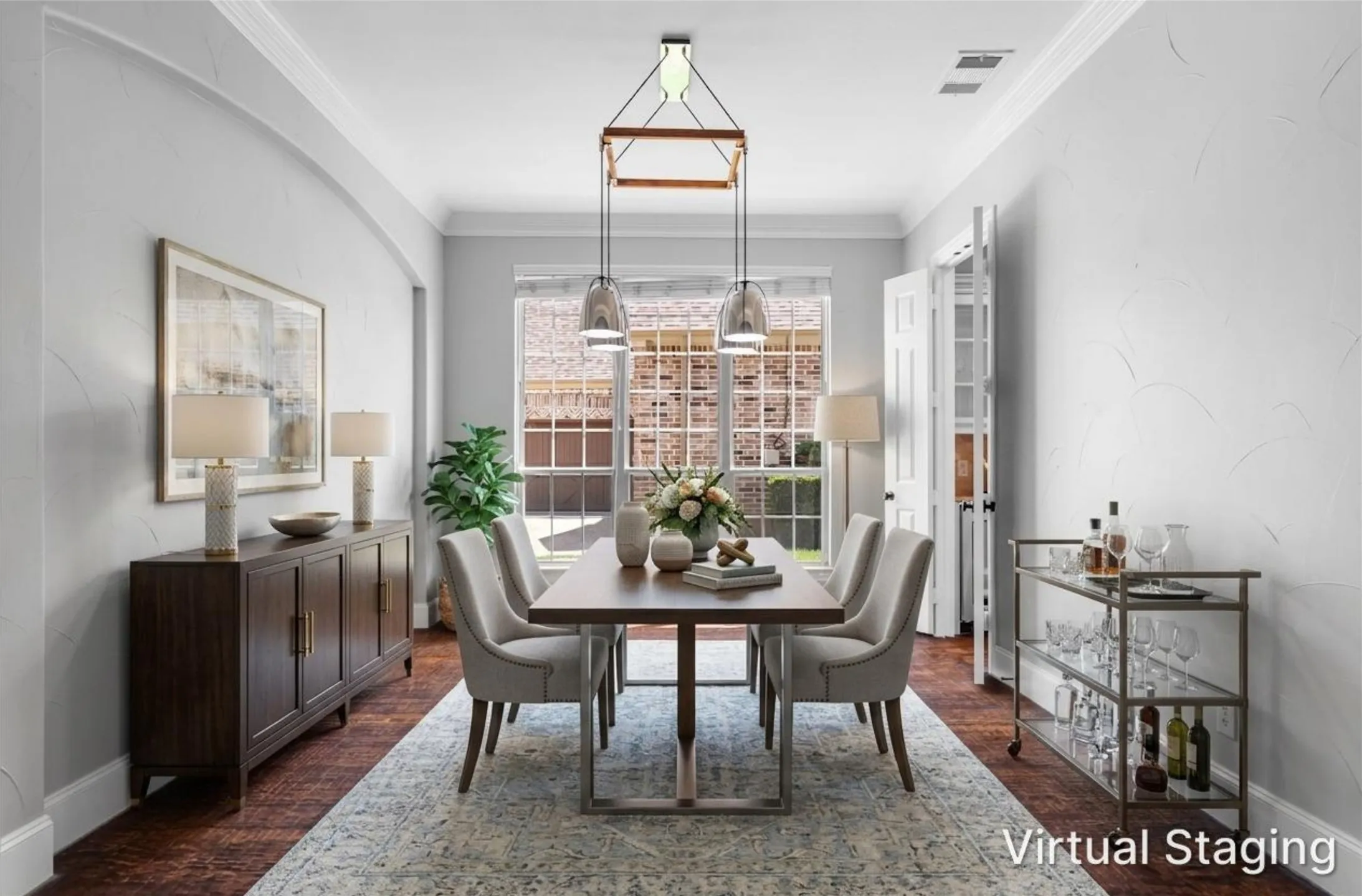 Formal living/dining area filled with natural light and large arched windows