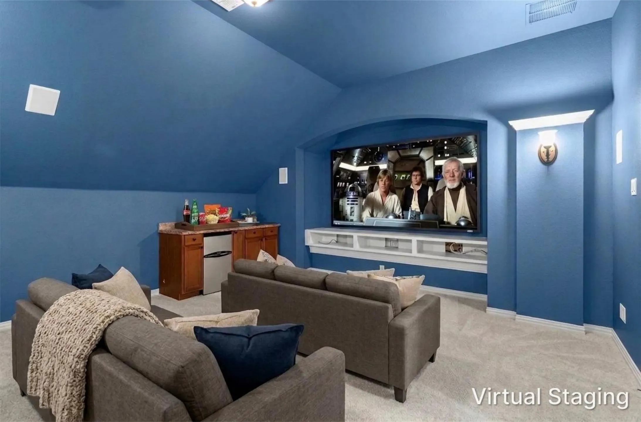 Dedicated media/theater room with built-in projector screen and cabinetry