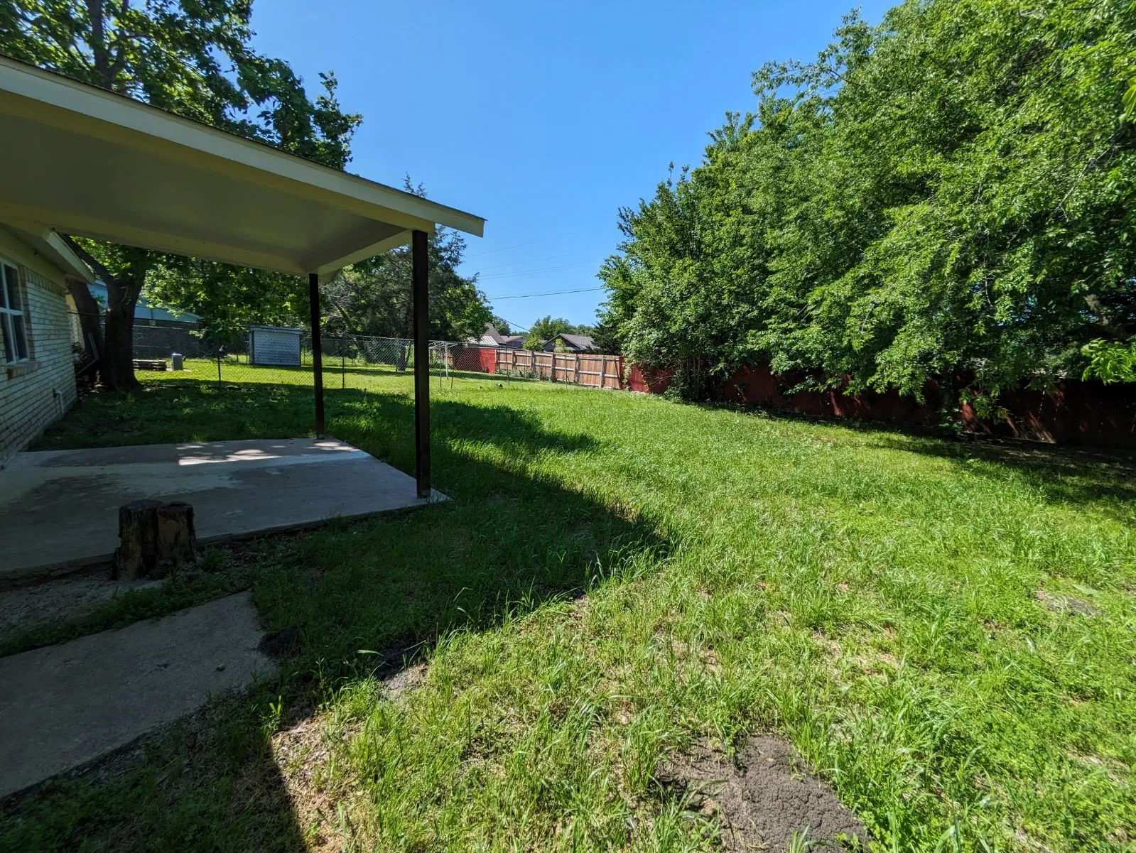 View of yard with a patio