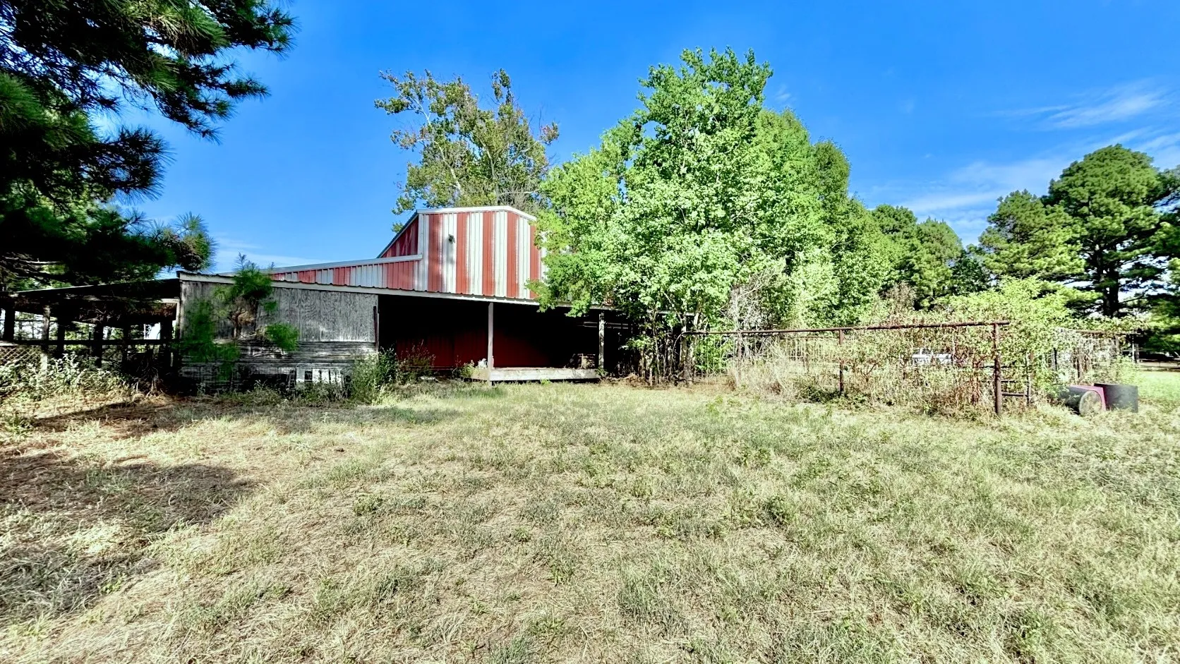 Fenced Chicken Pen and Pipe Fence Paddock in Back of Red Barn.