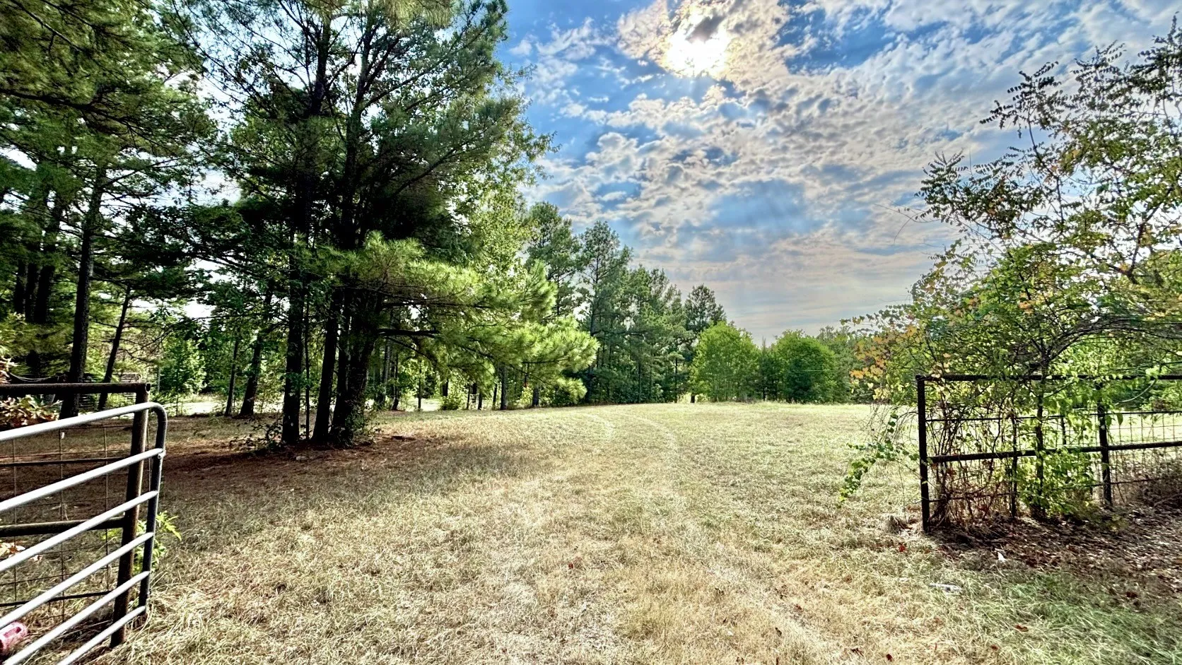 Gate to Pasture in the back of the Red Brick Home.