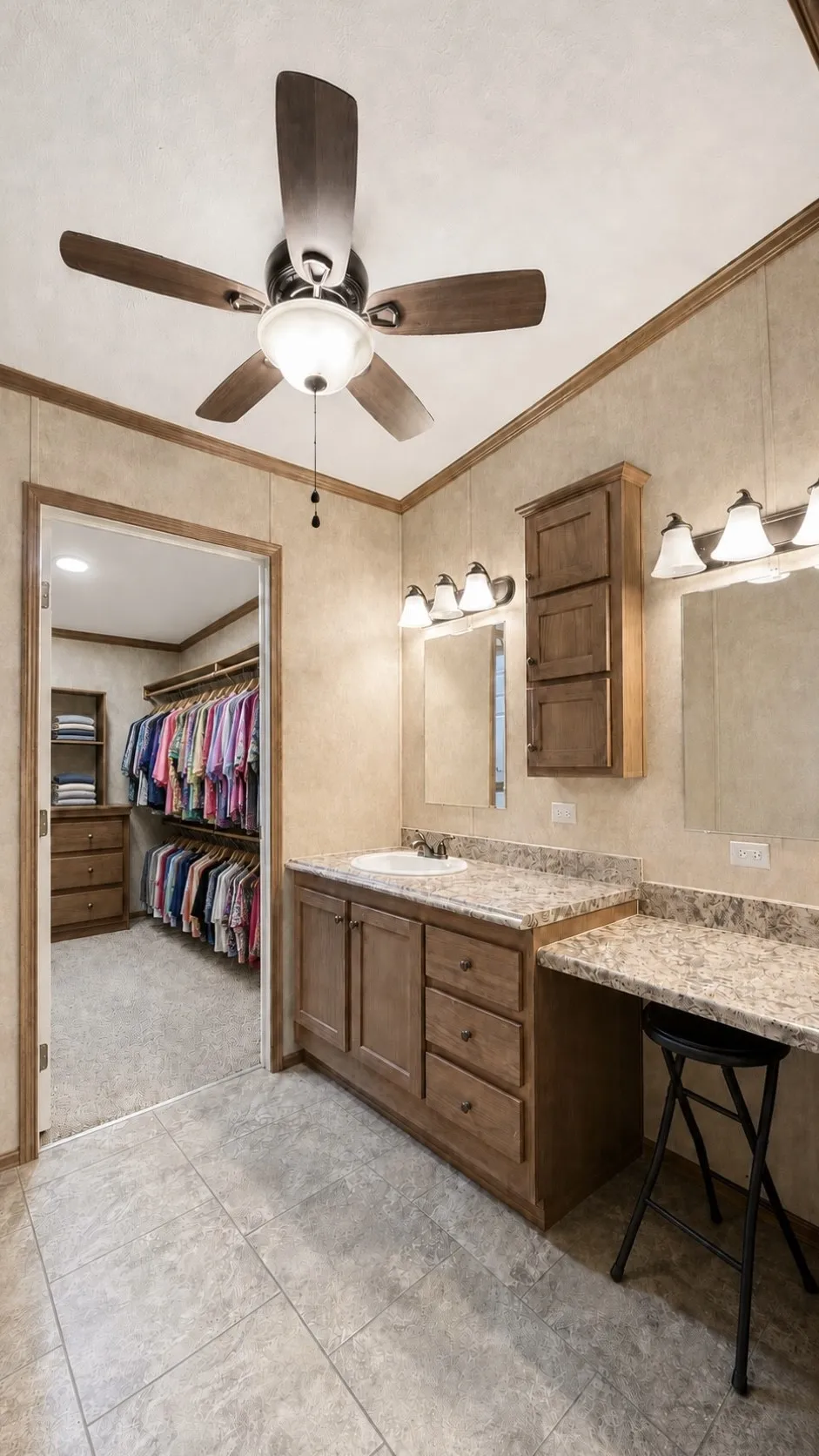 Second Sink and Makeup Area that Leads into Second Walk-In Closet in Double-Wide Home.