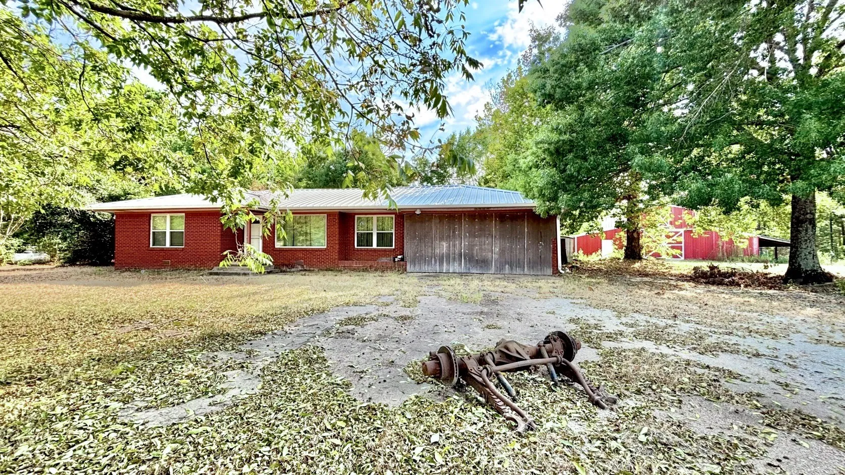 2 Bedroom, 1 Bath, 2 Living Areas, Enclosed Carport Red Brick Home.