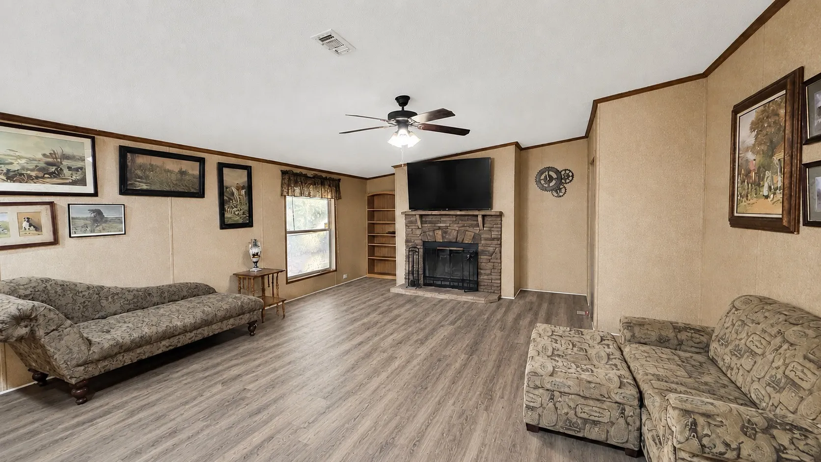 Second Living Area with Fireplace in Double-Wide Home.