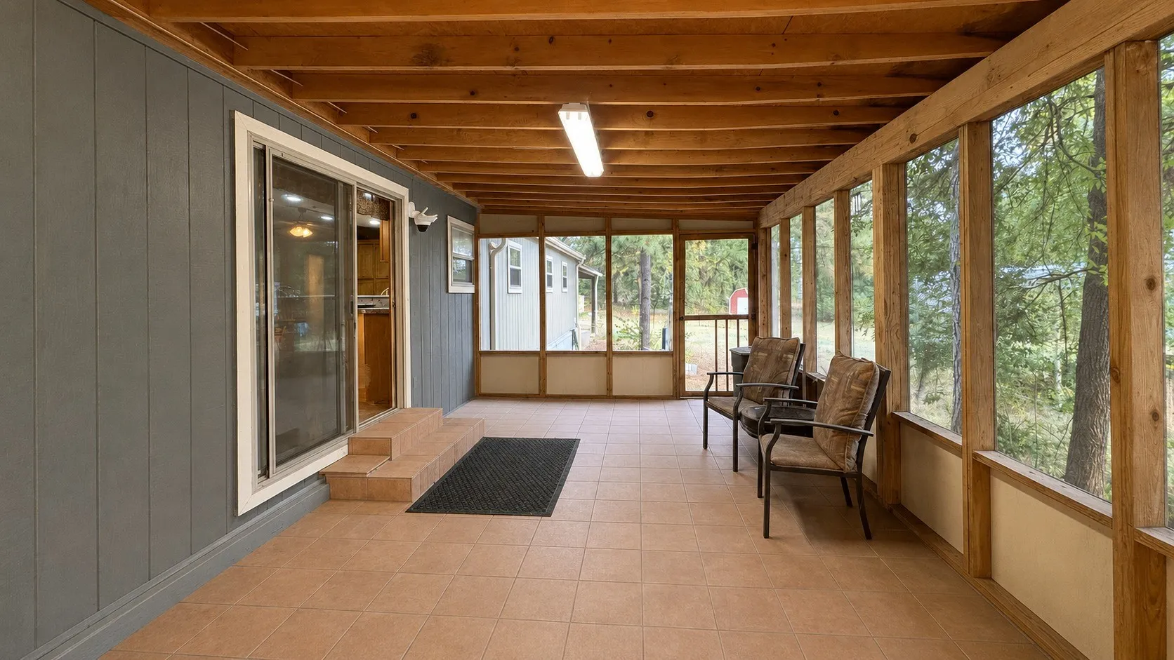 Screened-in Back Patio to Double-Wide Home.