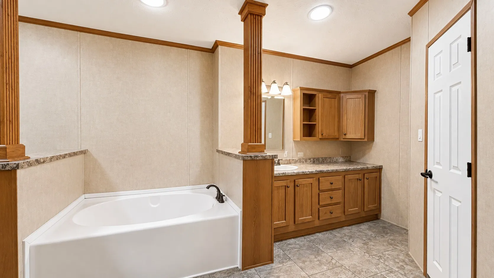 Primary Bathroom Toilet Area and Separate Walk-In Shower in Double-Wide Home.