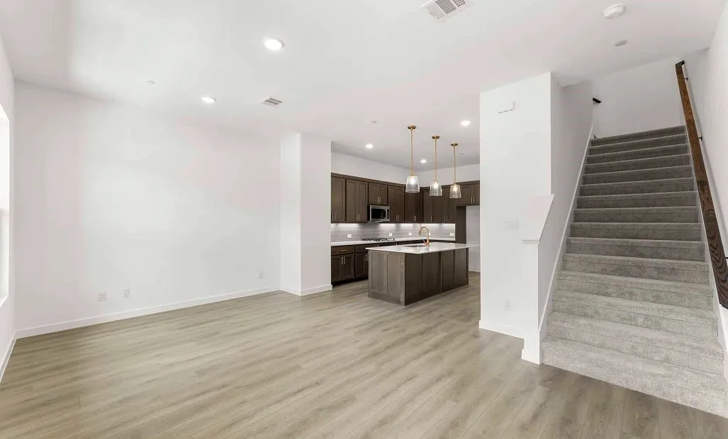 Open Kitchen-Living-Dining Room featuring the Laguna Collection