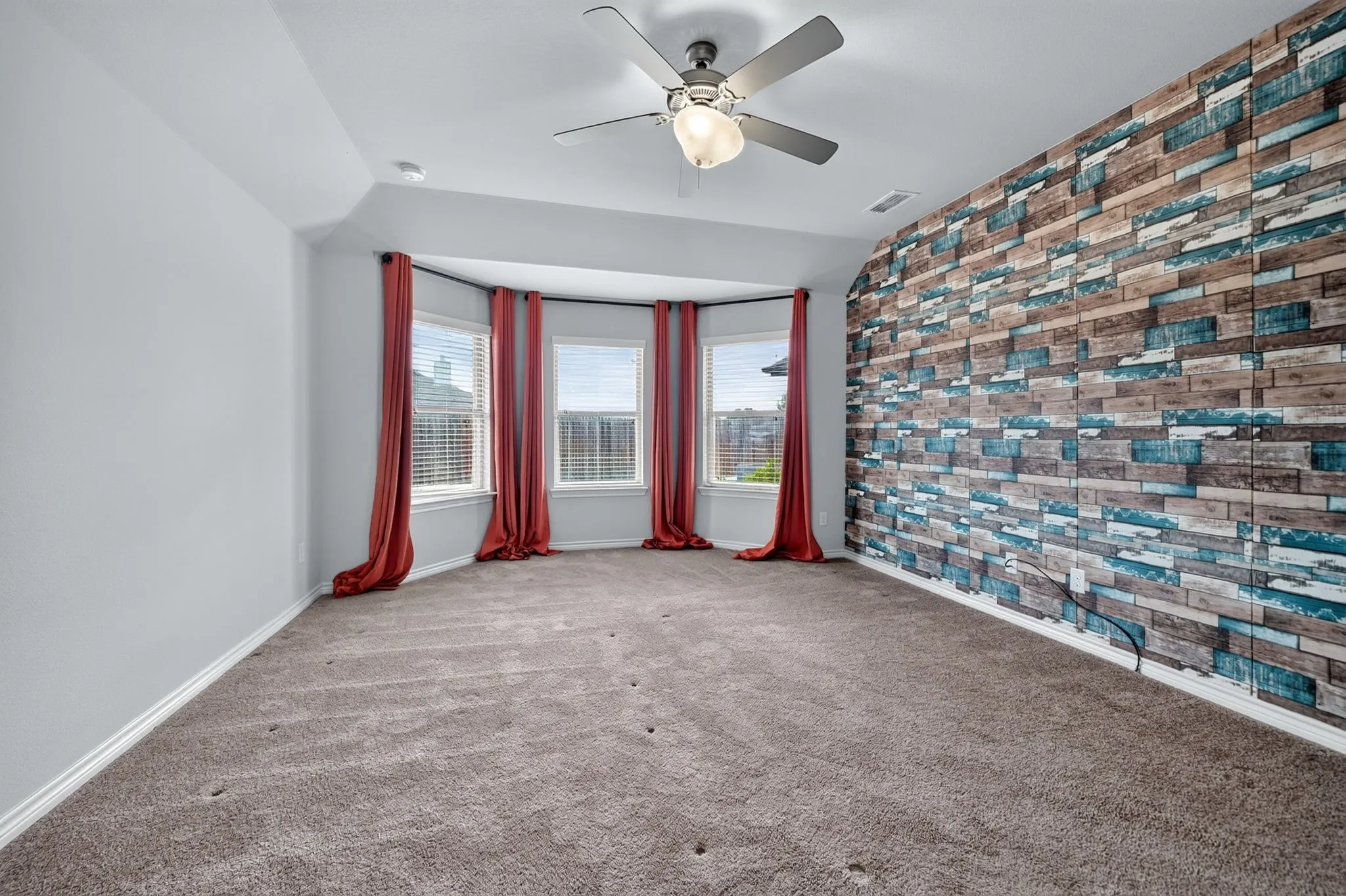 Recessed ceiling with a modern ceiling fan and lighting fixture