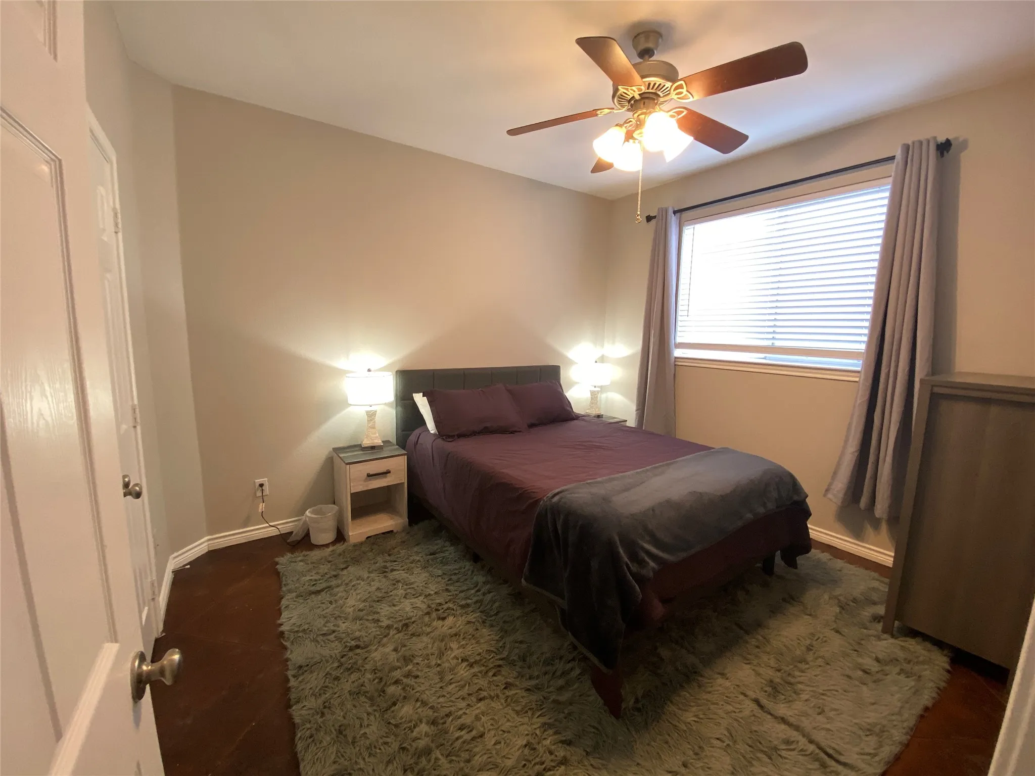 Recessed lighting, wood-finish flooring, and a ceiling fan with light fixture