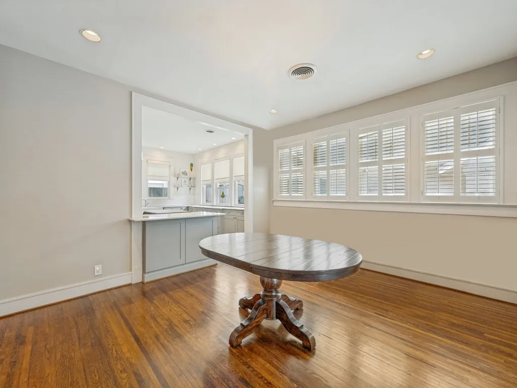 Wood-finish flooring, recessed lighting, and built-in window shutters