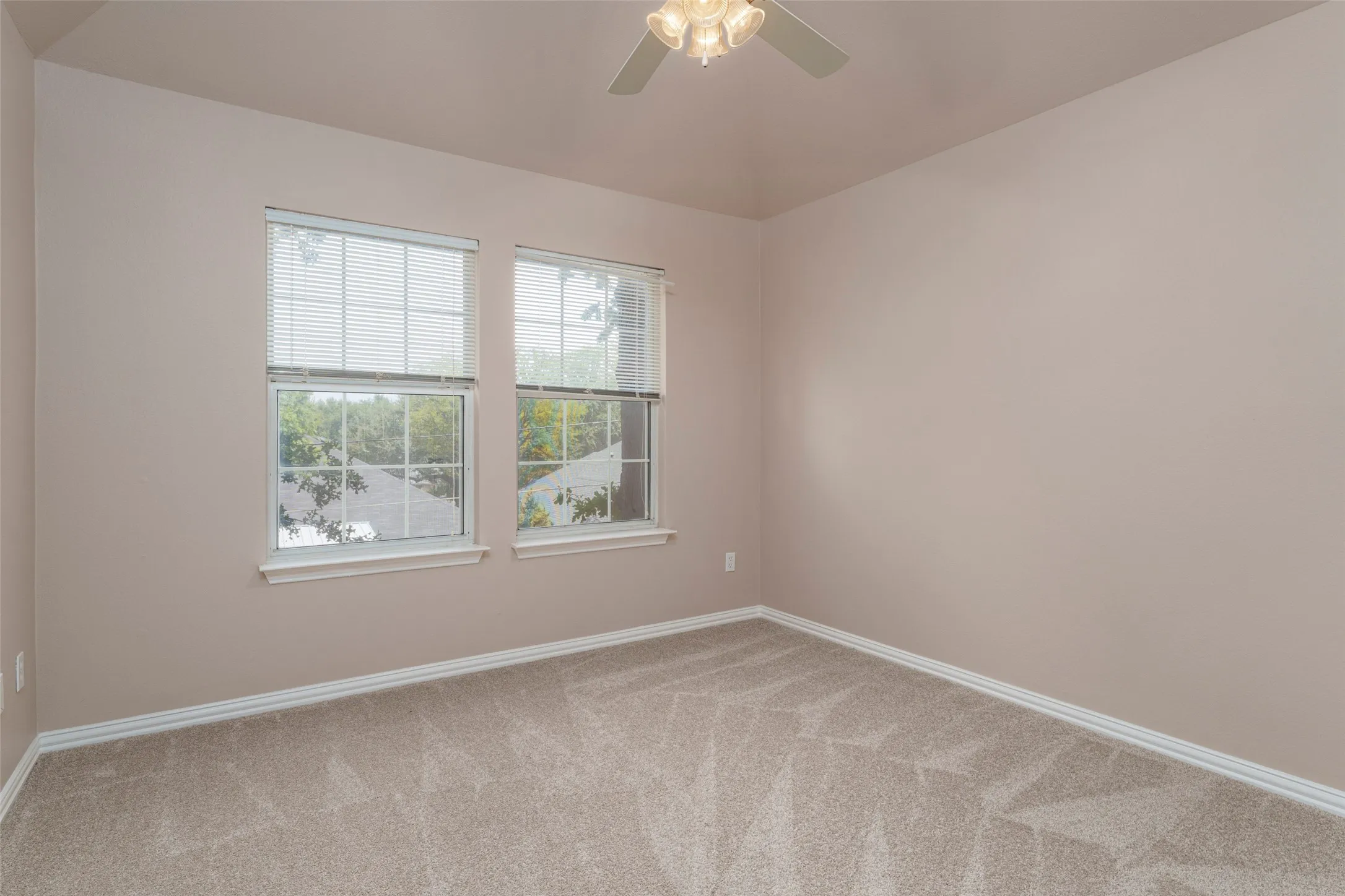 Wall-to-wall carpeting and neutral wall tones