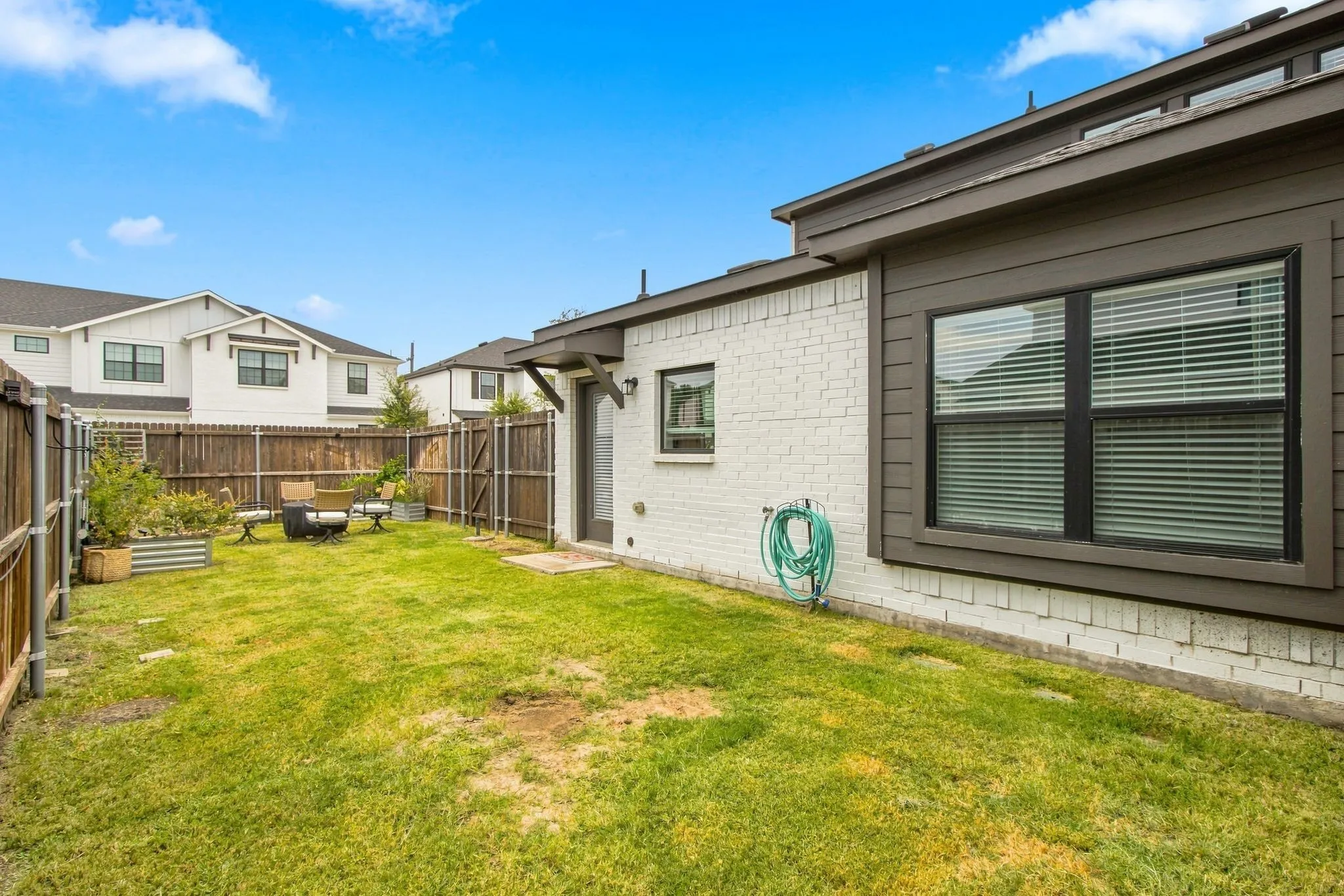 The backyard has plenty of room for you to bring your own firepit for S'mores or for kids to enjoy the outdoors.