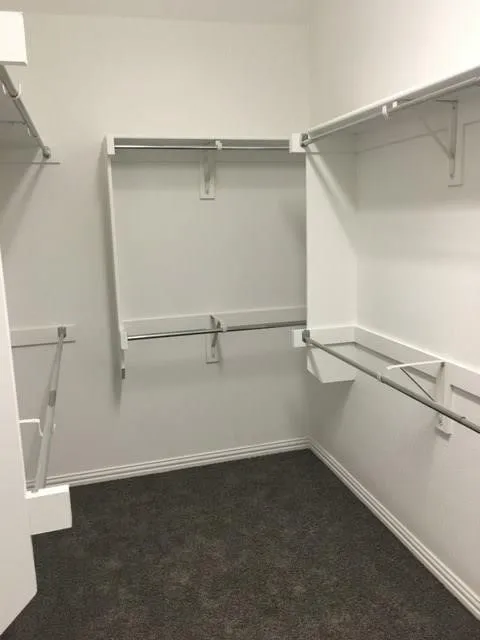 Built-in closet shelving and hanging rods