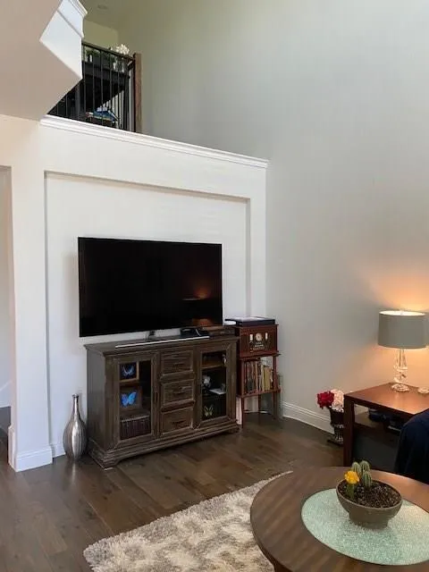 Wood-finish flooring throughout the space