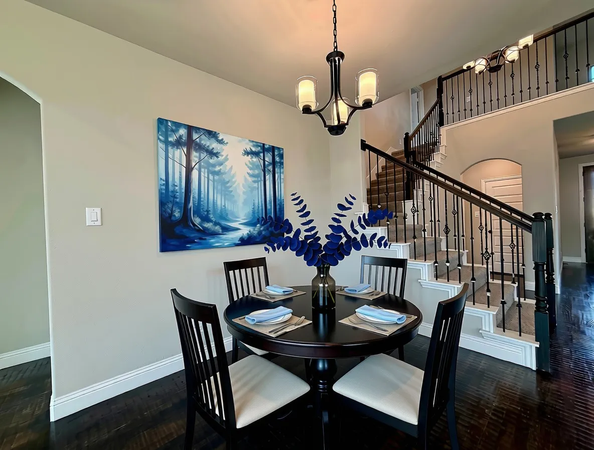 Dining area with hardwoods and Matte Black chandelier