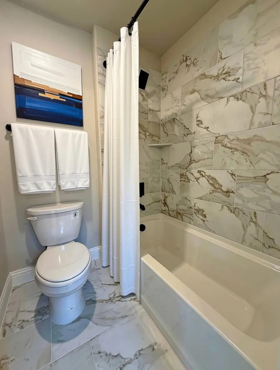 Separate commode & shower area in Jack & Jill bath makes it easier to share