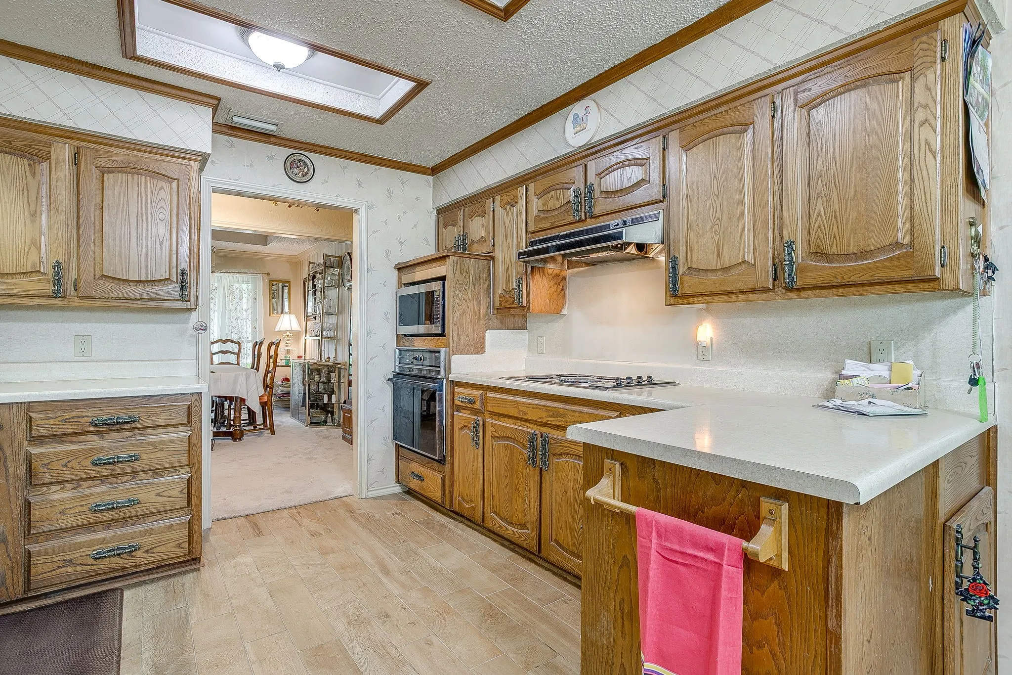 Wood-finish flooring with extensive wood cabinetry