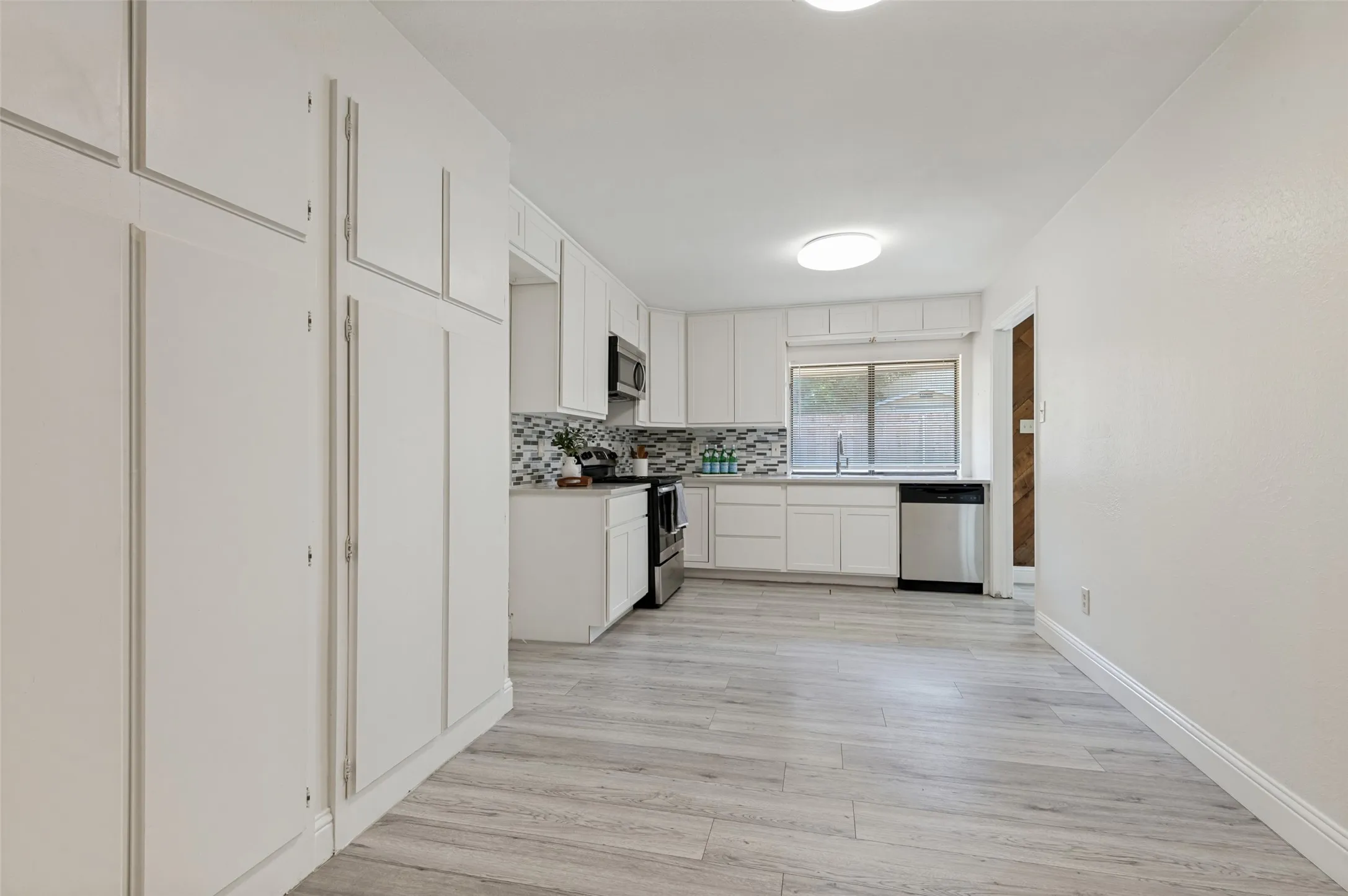 View of dining area into the kitchen