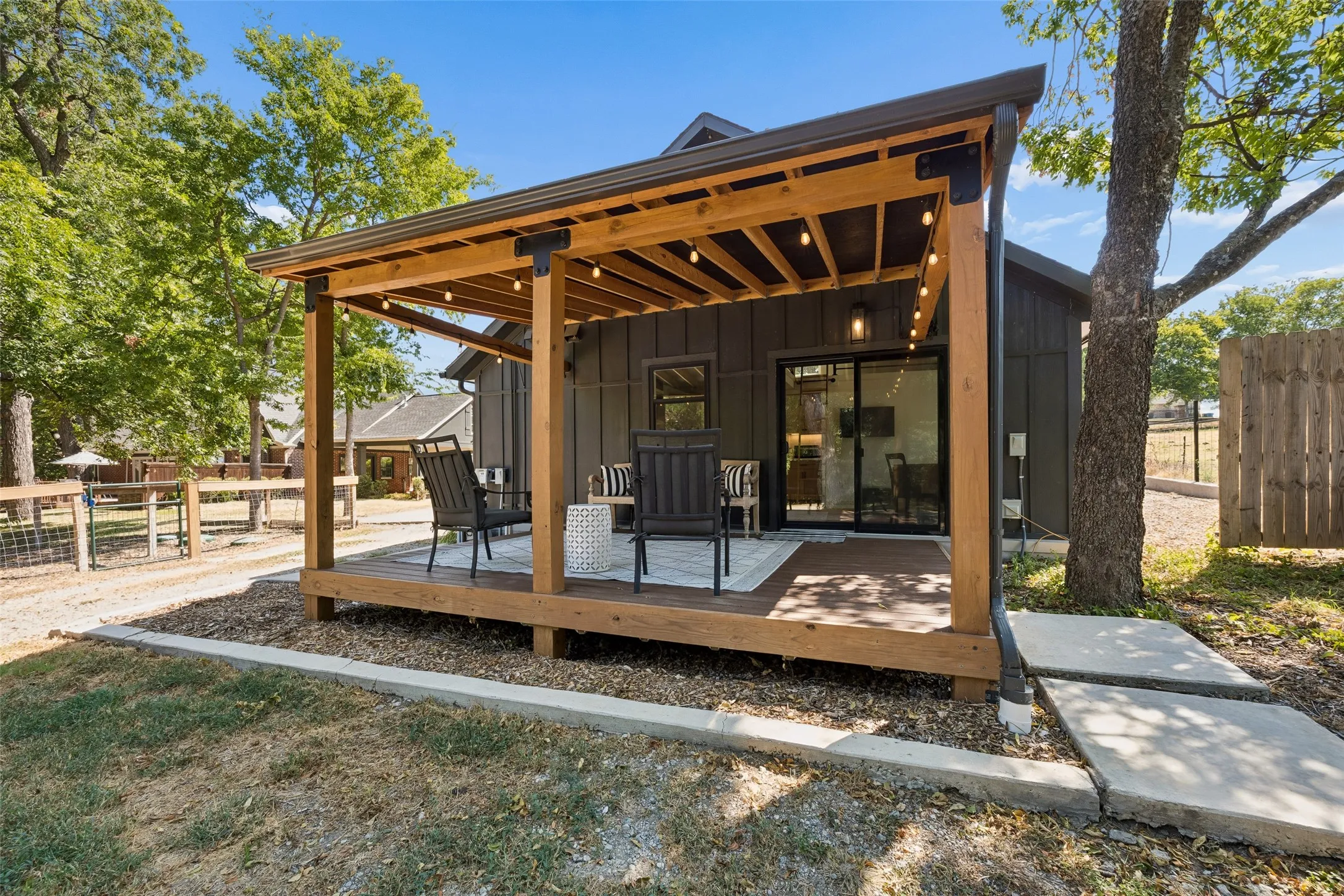 Guests Are Sure To Enjoy Their Morning Coffee on The Back Porch Overlooking the Grounds