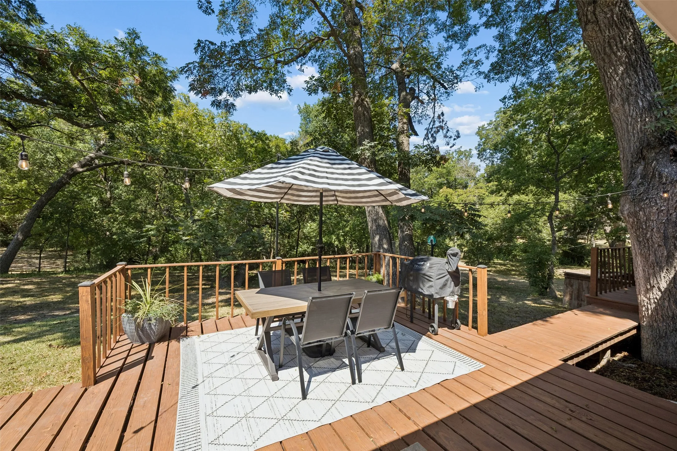 Spacious Deck Looking Over Wooded Creek Lot