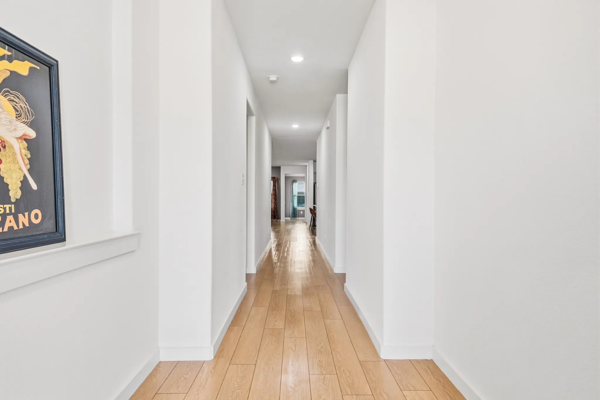 Exceptional living spaces stretch from the front entry to the backyard.