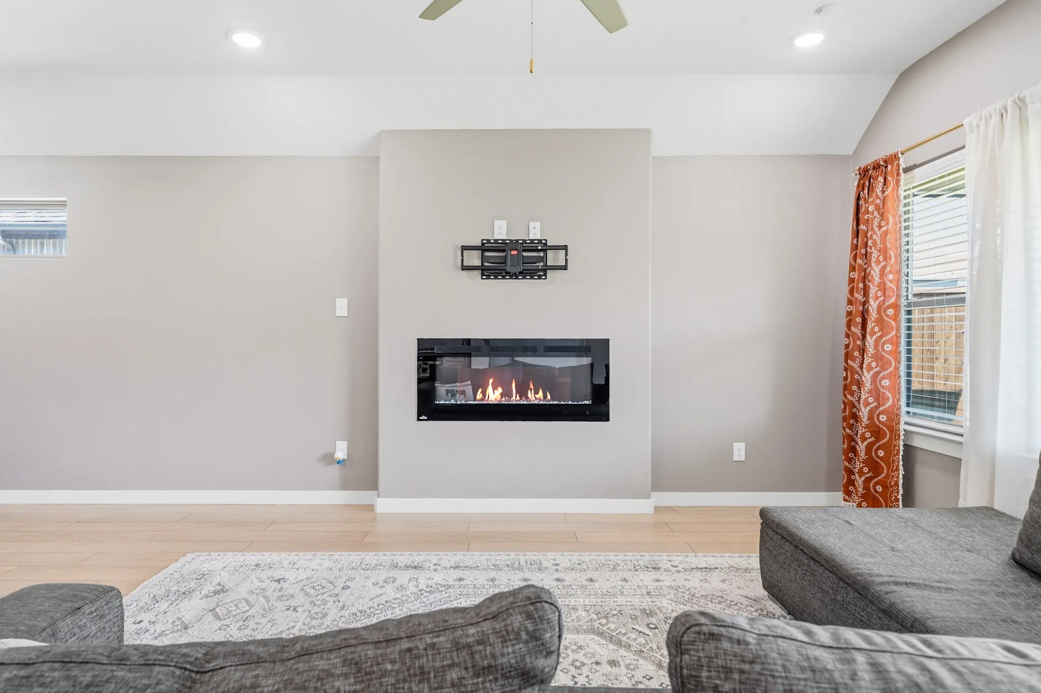 From the thoughtfully placed TV mount to the inviting electric fireplace, there are lots of features to help you get cozy on the couch!