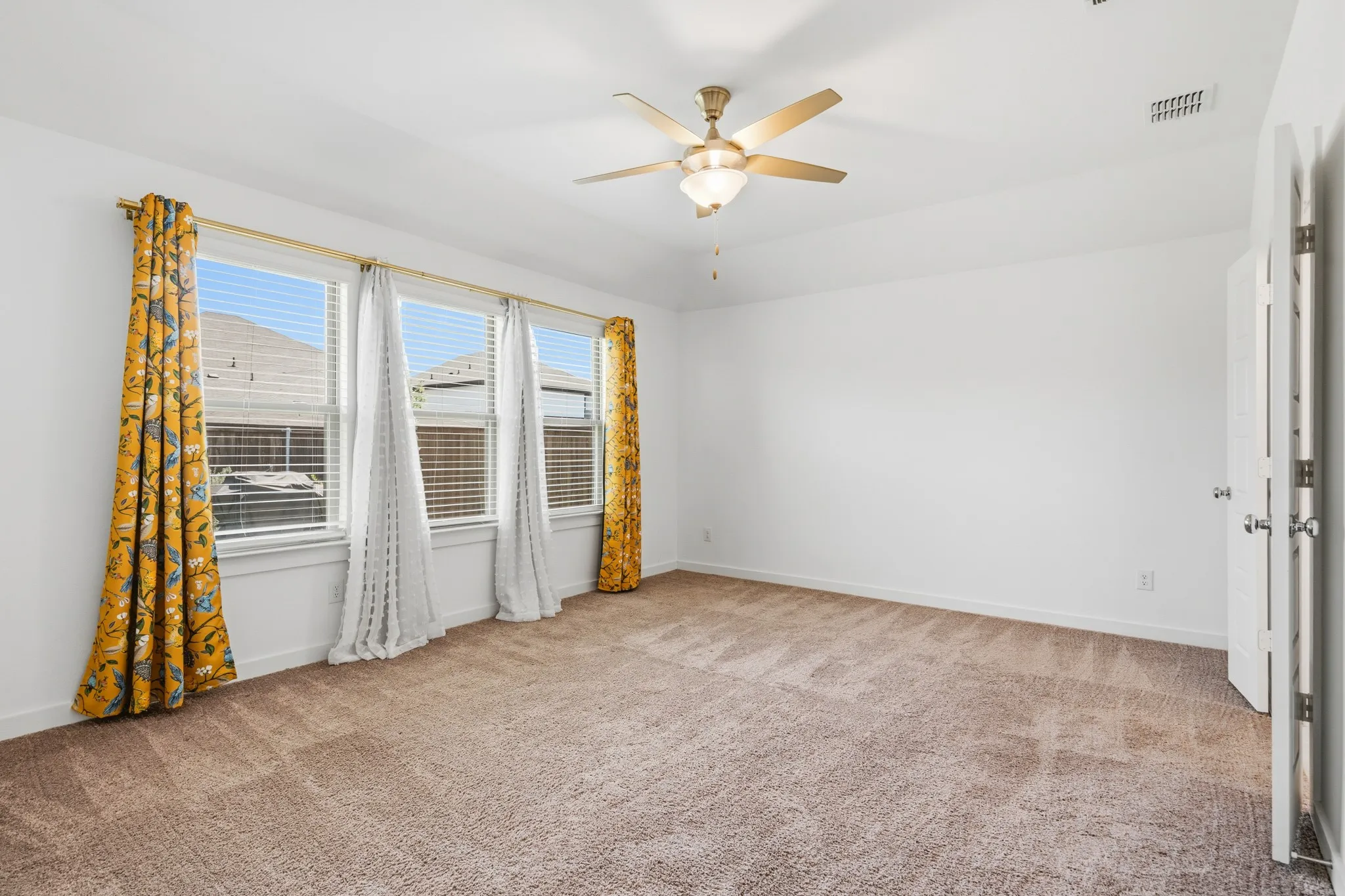 The primary bedroom feels like the Royal Suite with the wall of windows and amount of space for the full suite experience.