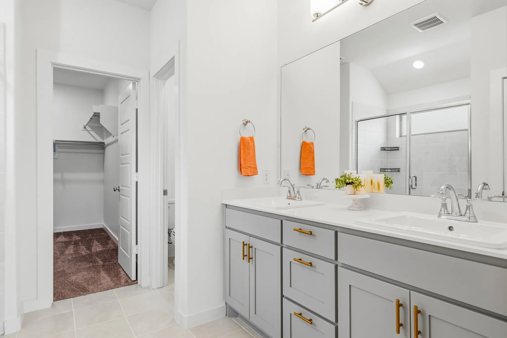 Double Vanities, Double-sized Shower, private water closet, separate linen closet and then the walk-in closet....oh my
