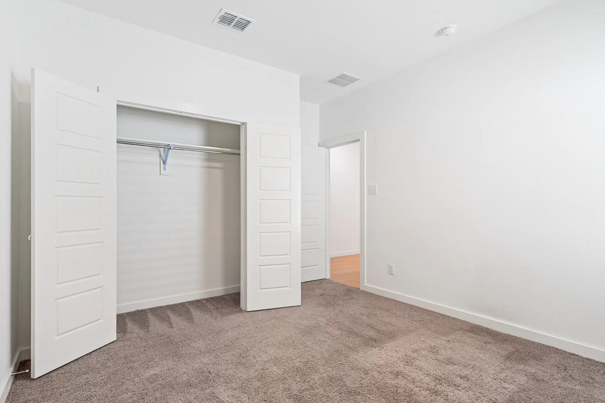 Bedroom #3 also features large double door closet & shares a hall and bathroom with Bedroom #2
