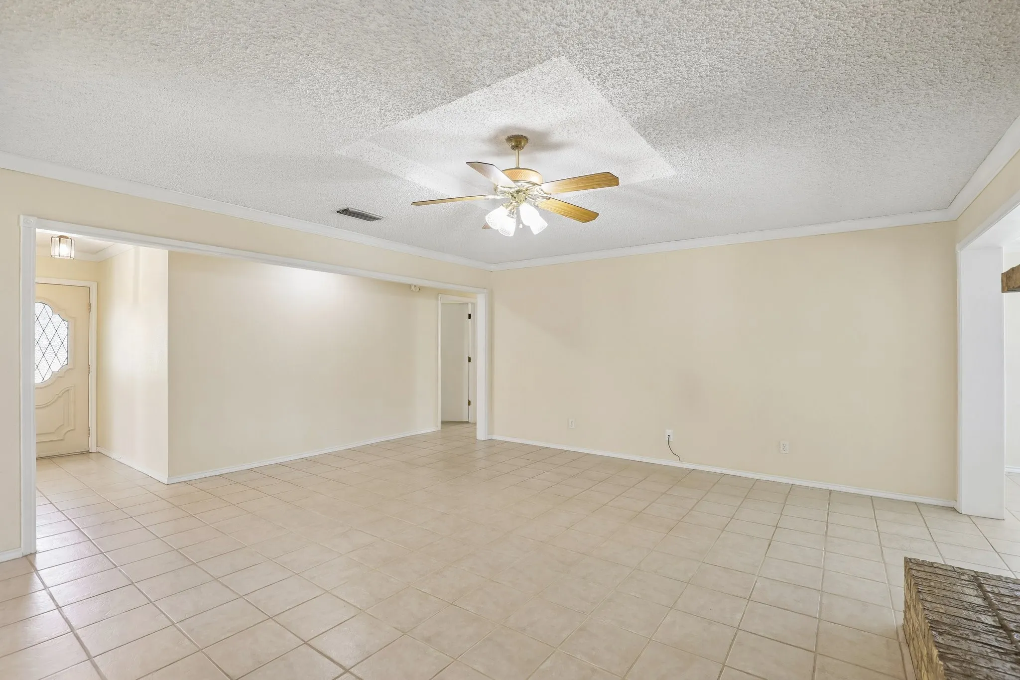 Spacious Living room with tiled flood.