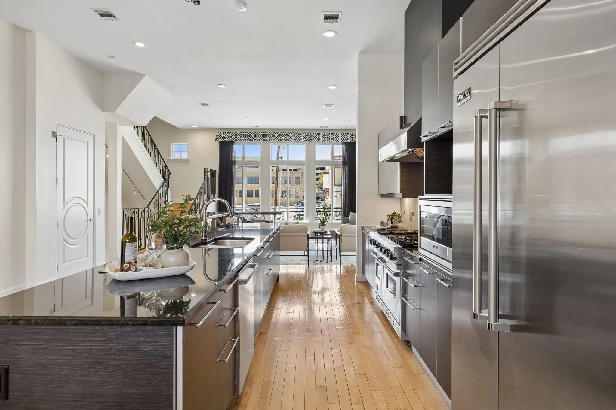 Elegant Black Granite Surfaces Complement The Gourmet Kitchen