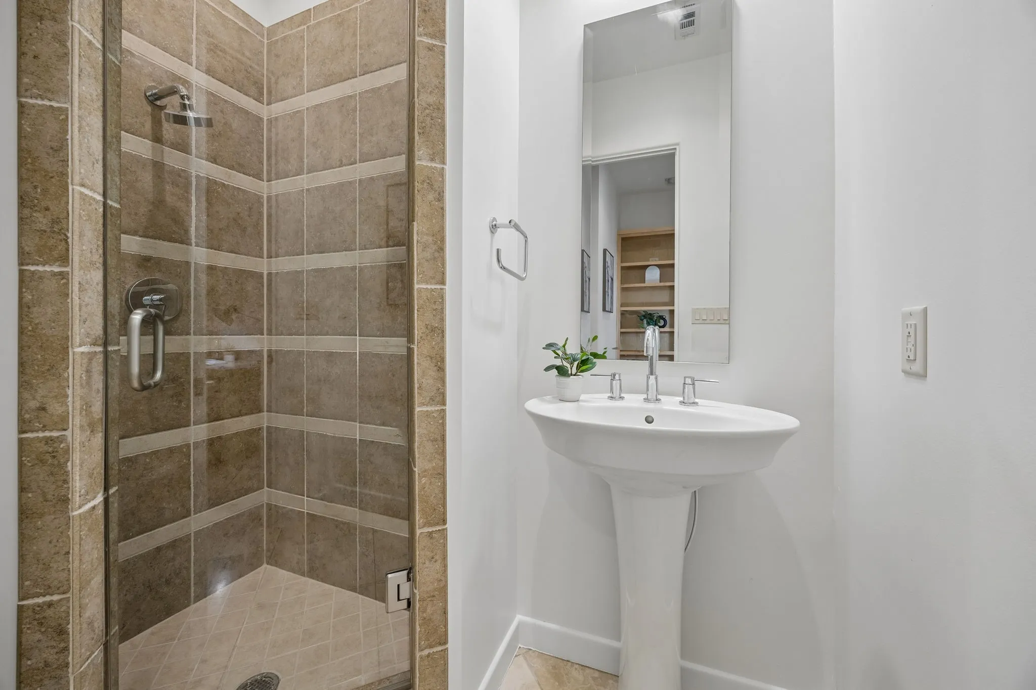 Full Bath With Glass-Enclosed Shower And Pedestal Sink