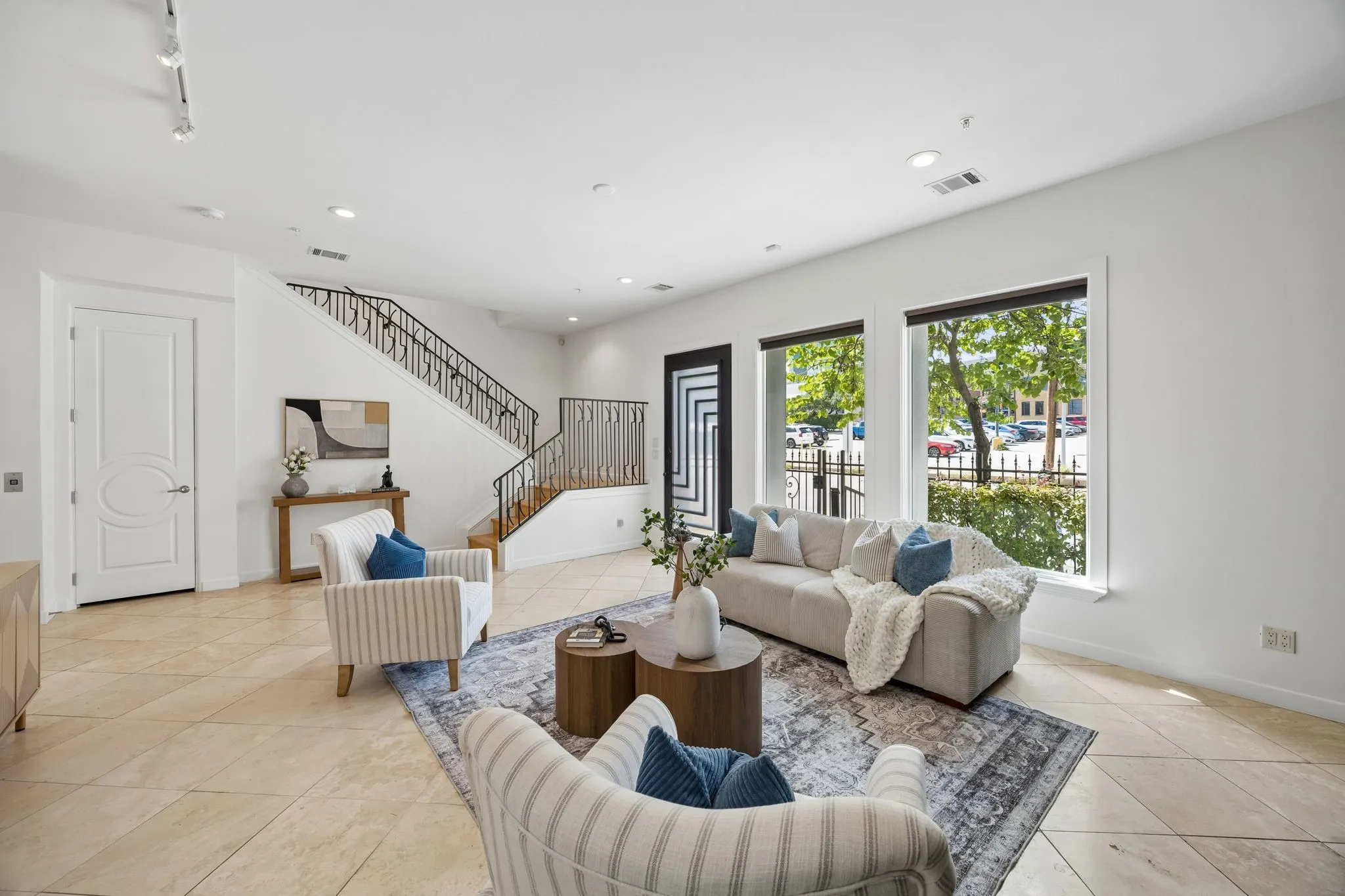 Sophisticated First-Floor Boasts Travertine Flooring And Cityscape Views