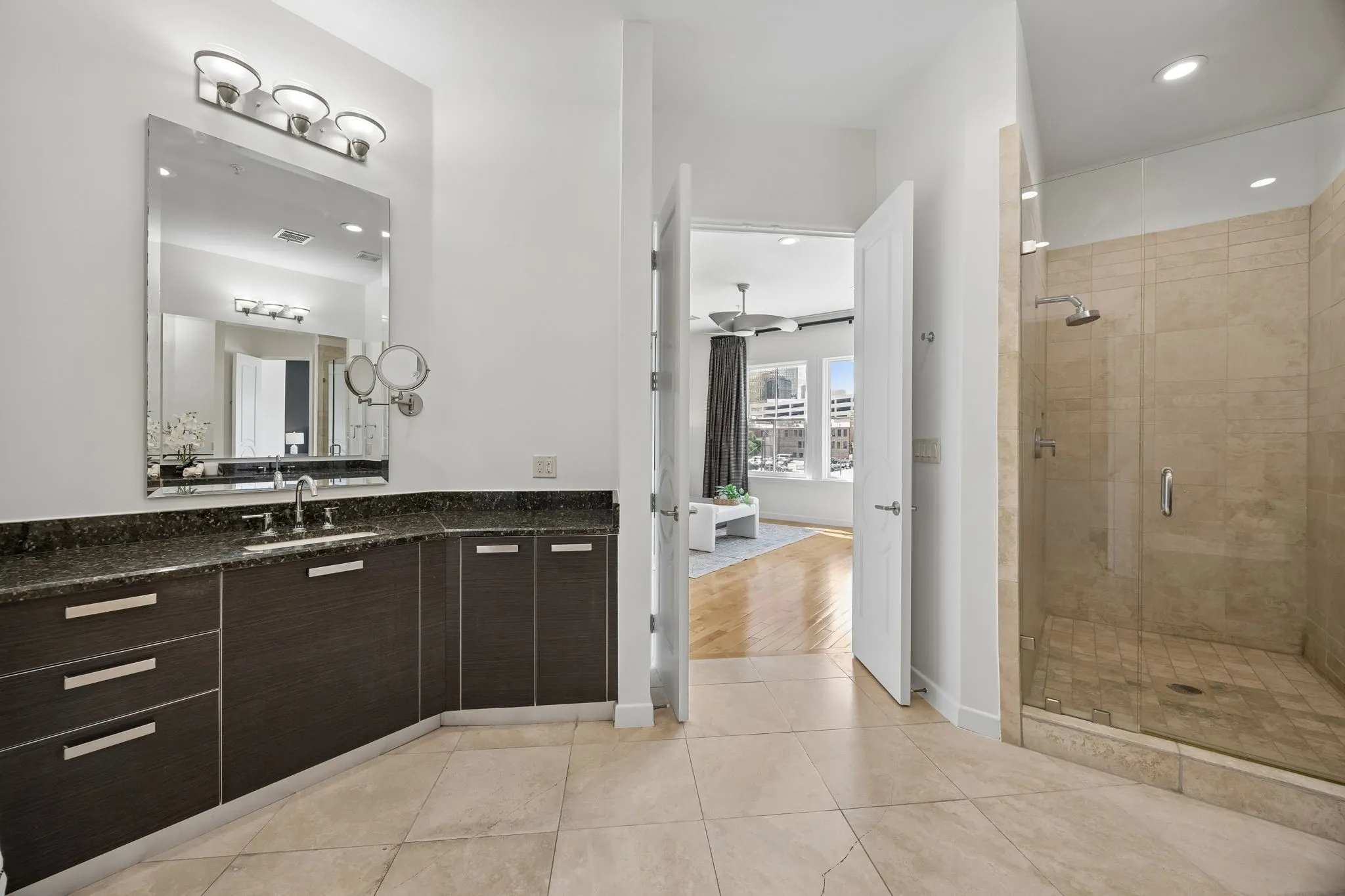 Designer Ensuite Featuring Travertine Floors And Premium Italian Cabinetry