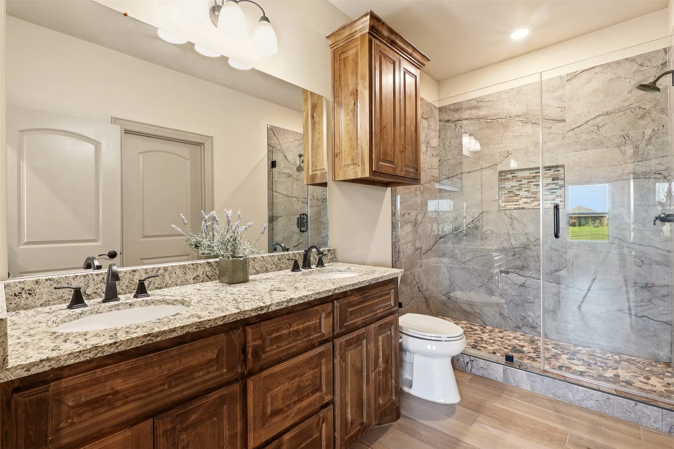 Dual vanity with granite countertop and undermount sinks