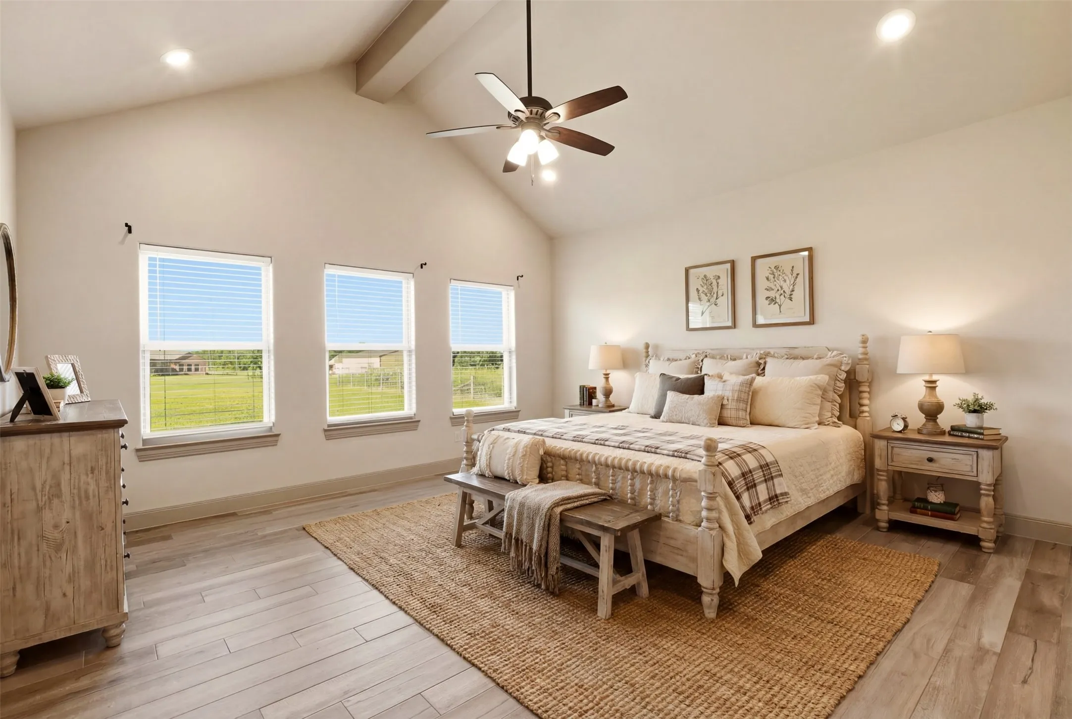 Vaulted ceiling with exposed beam, ceiling fan with integrated lighting, recessed lighting, three windows with blinds, and wood-finish flooring